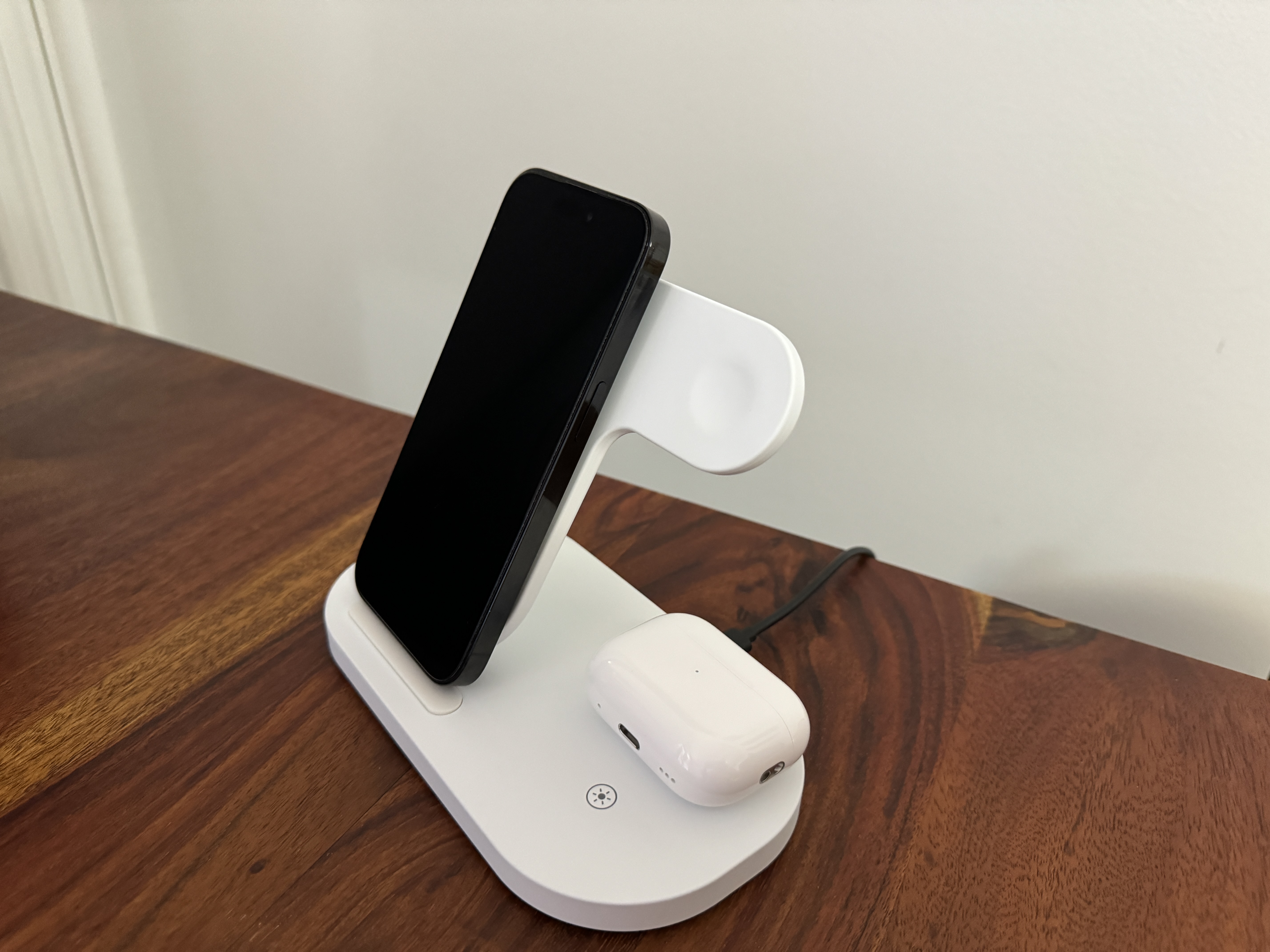 empty charging stand on wooden table