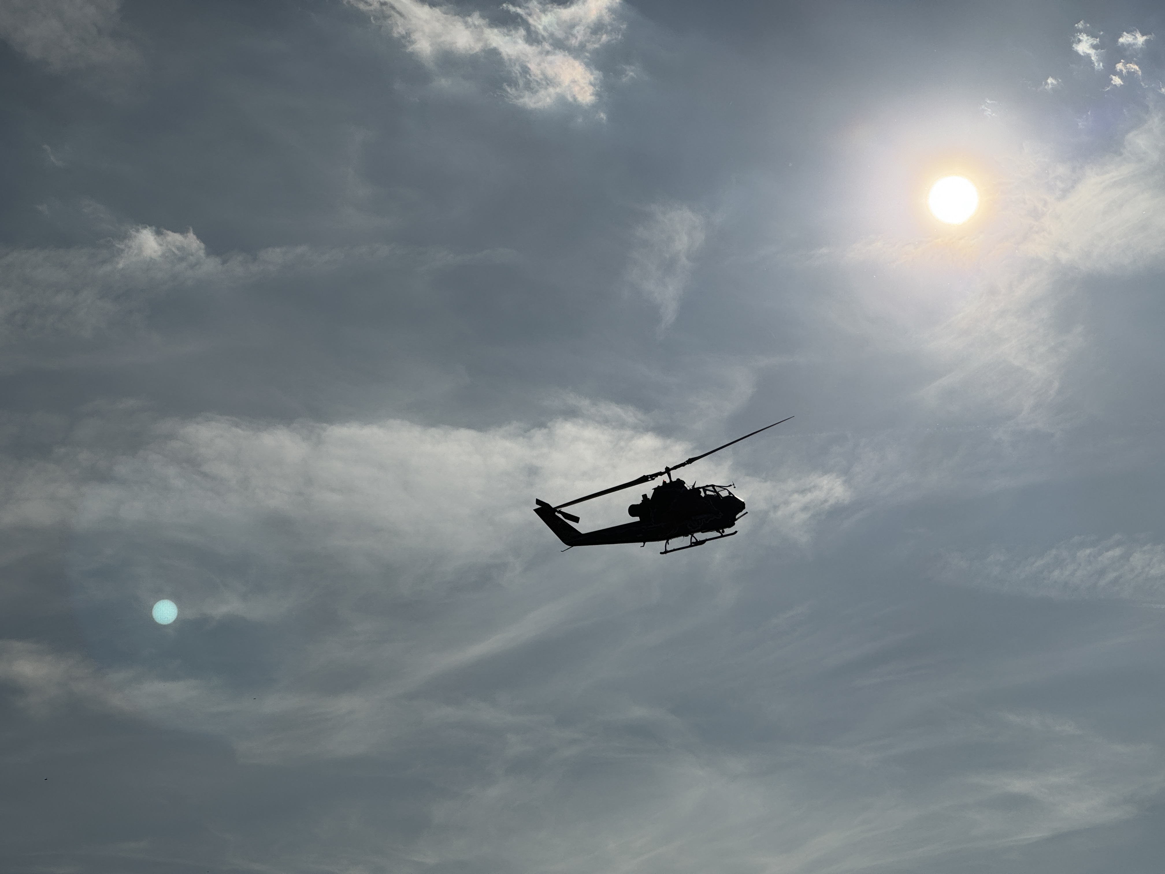 helicopter silhouette bright sun