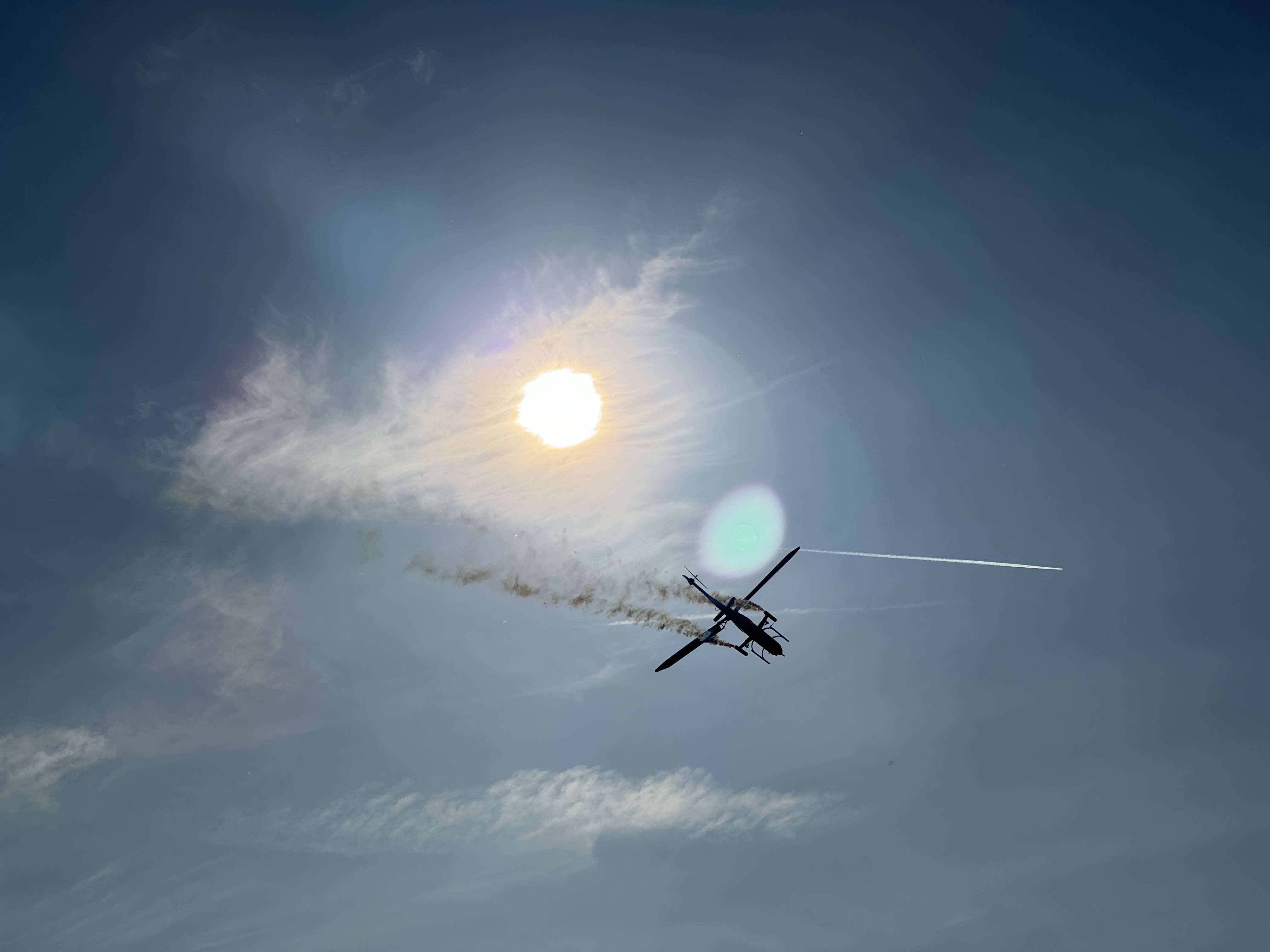 helicopter silhouette sun