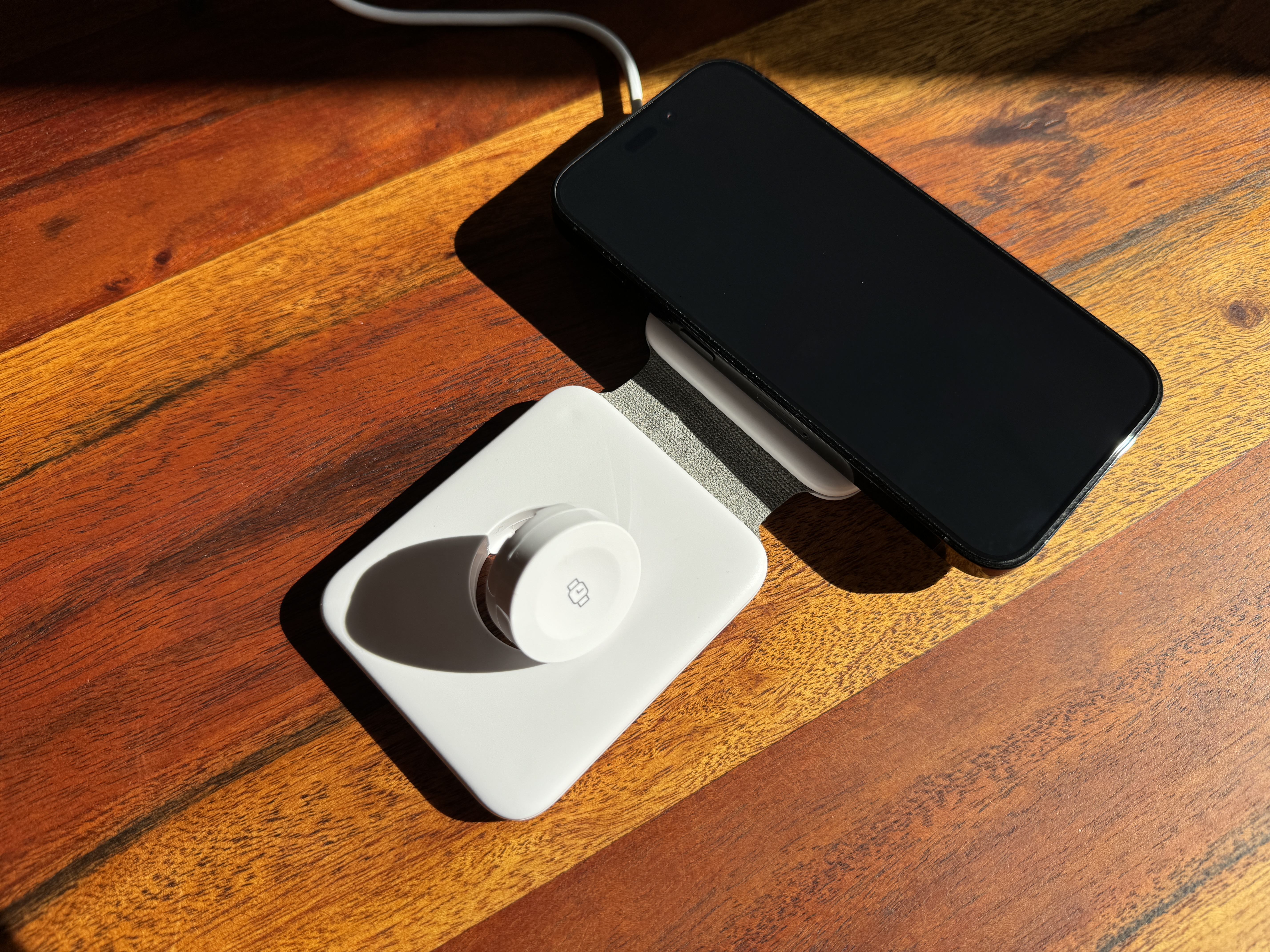 phone and charger on table