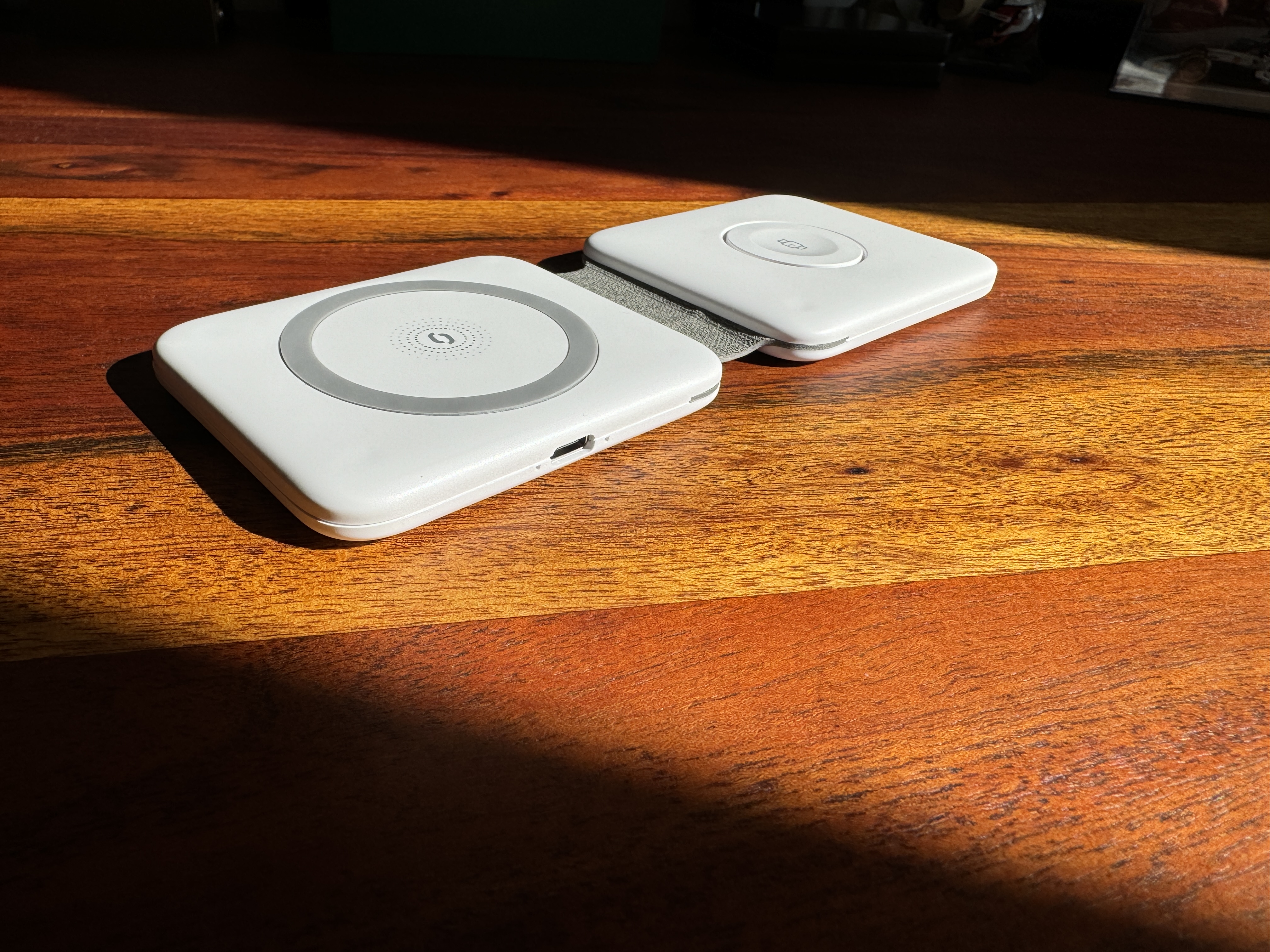 white wireless charger on wood