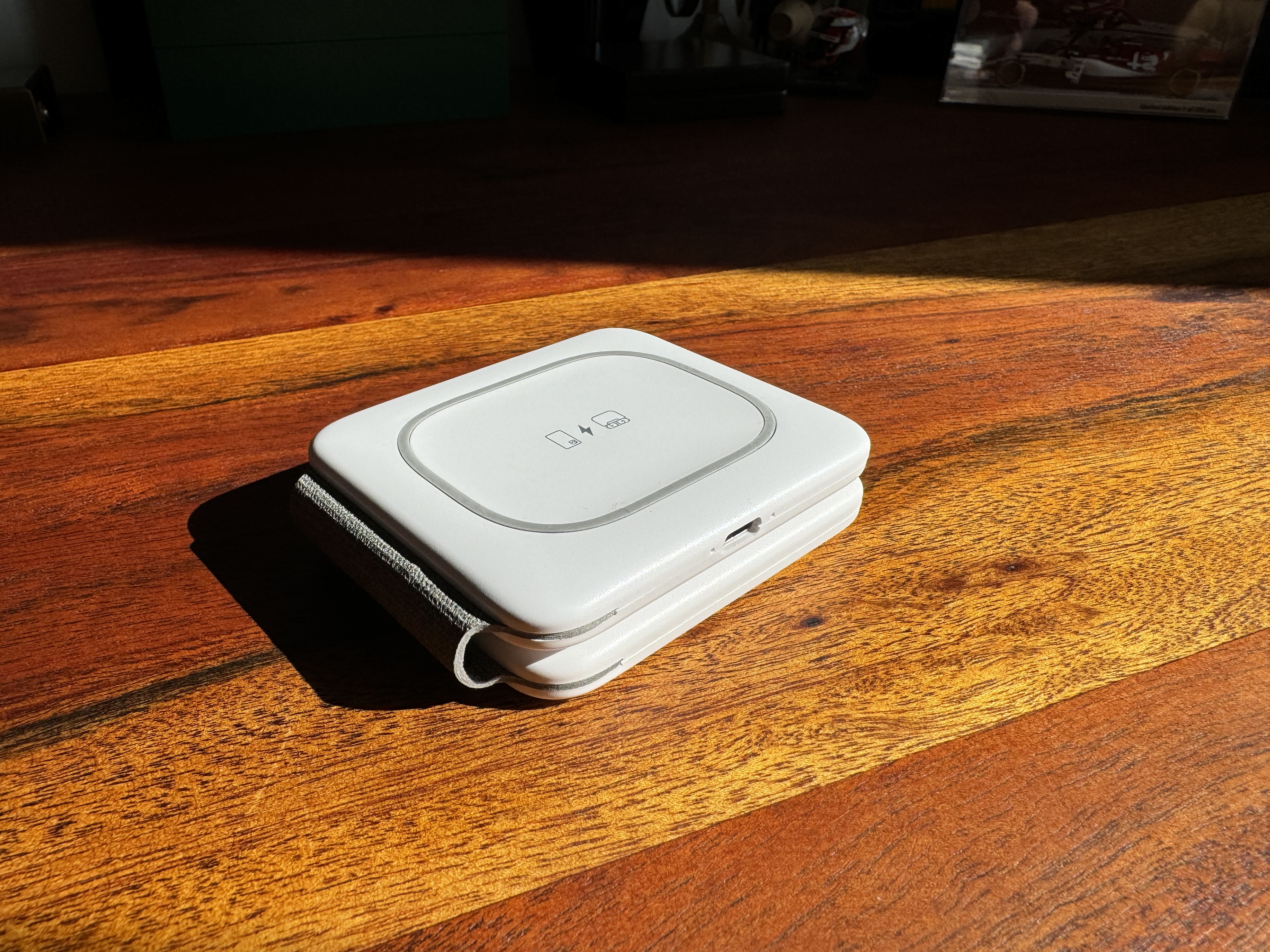 wireless charger on wooden table