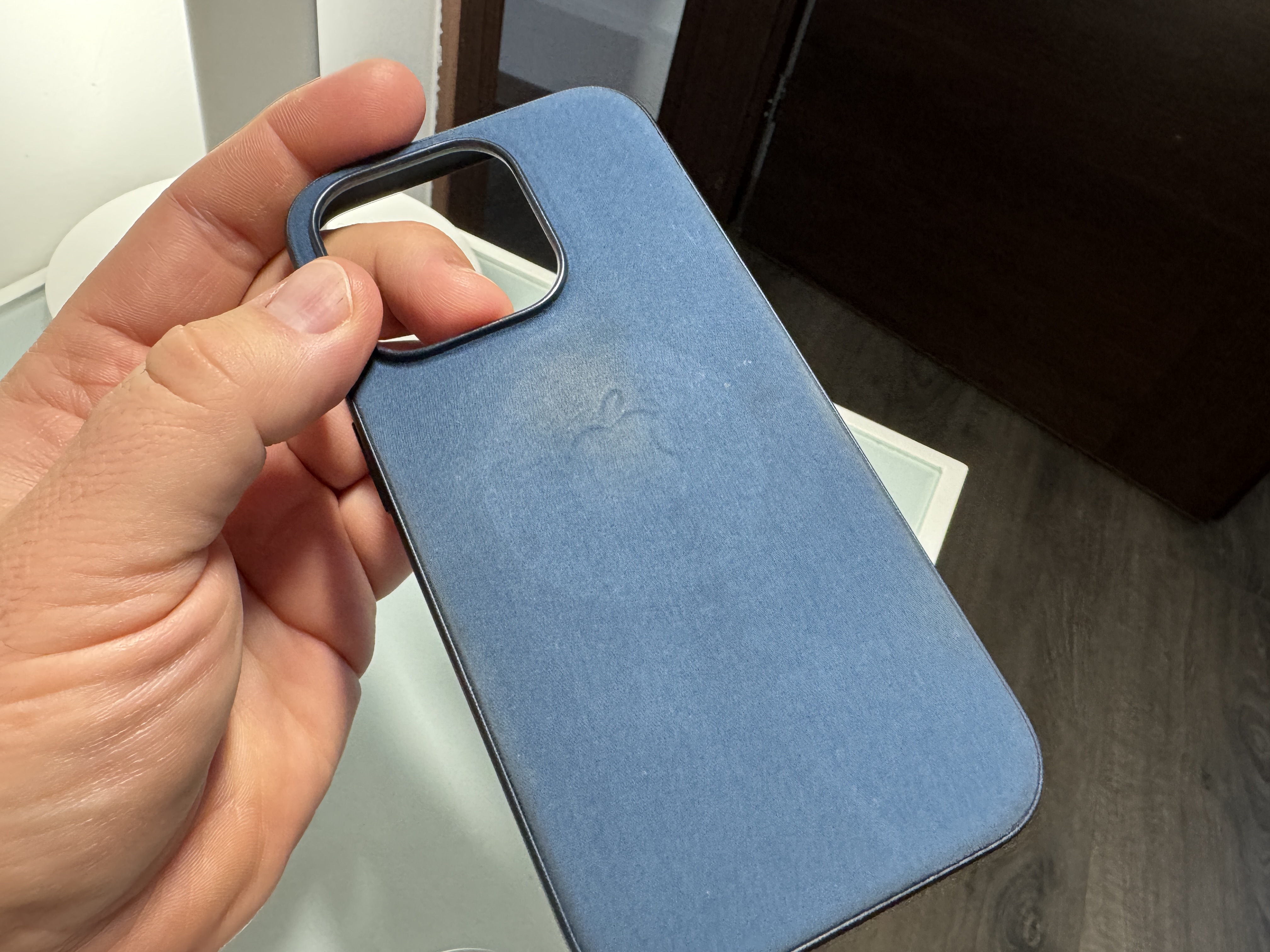 blue phone case hand view