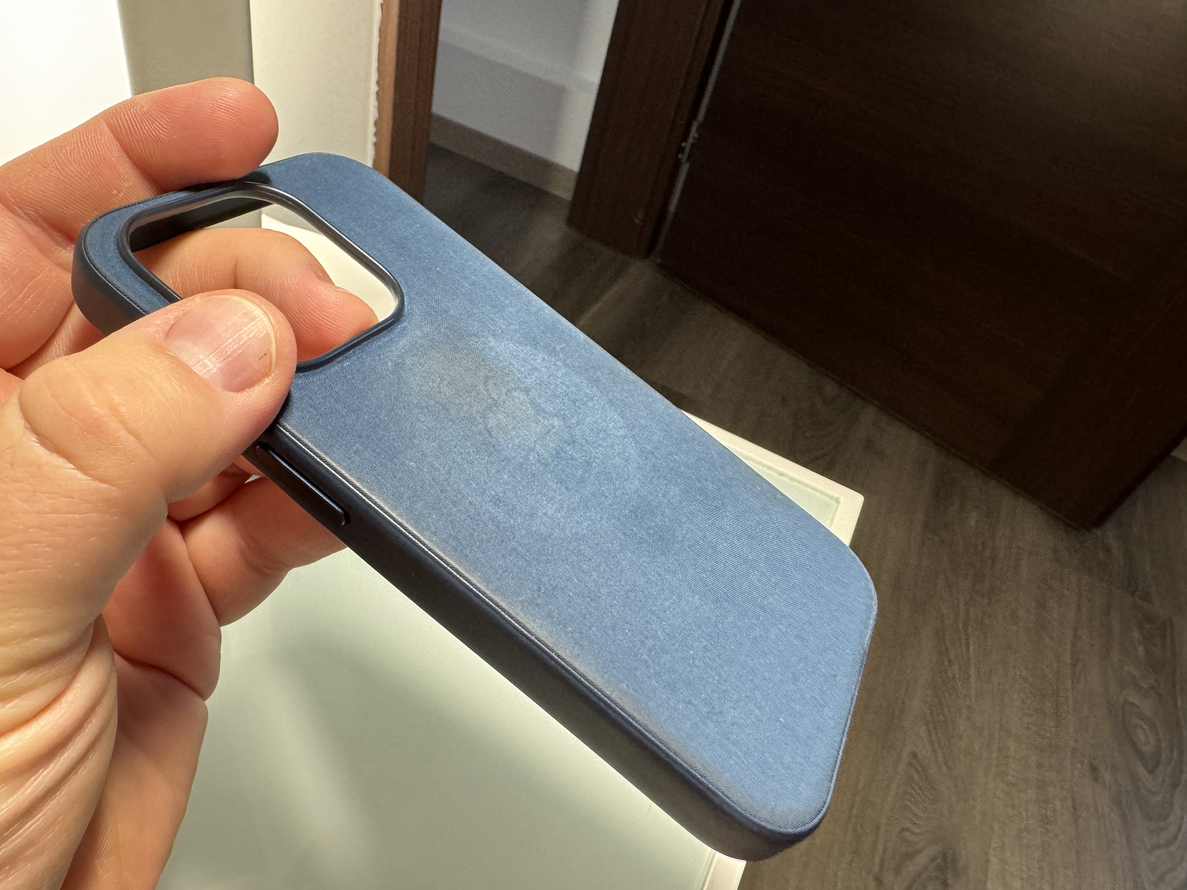 blue phone case in hand