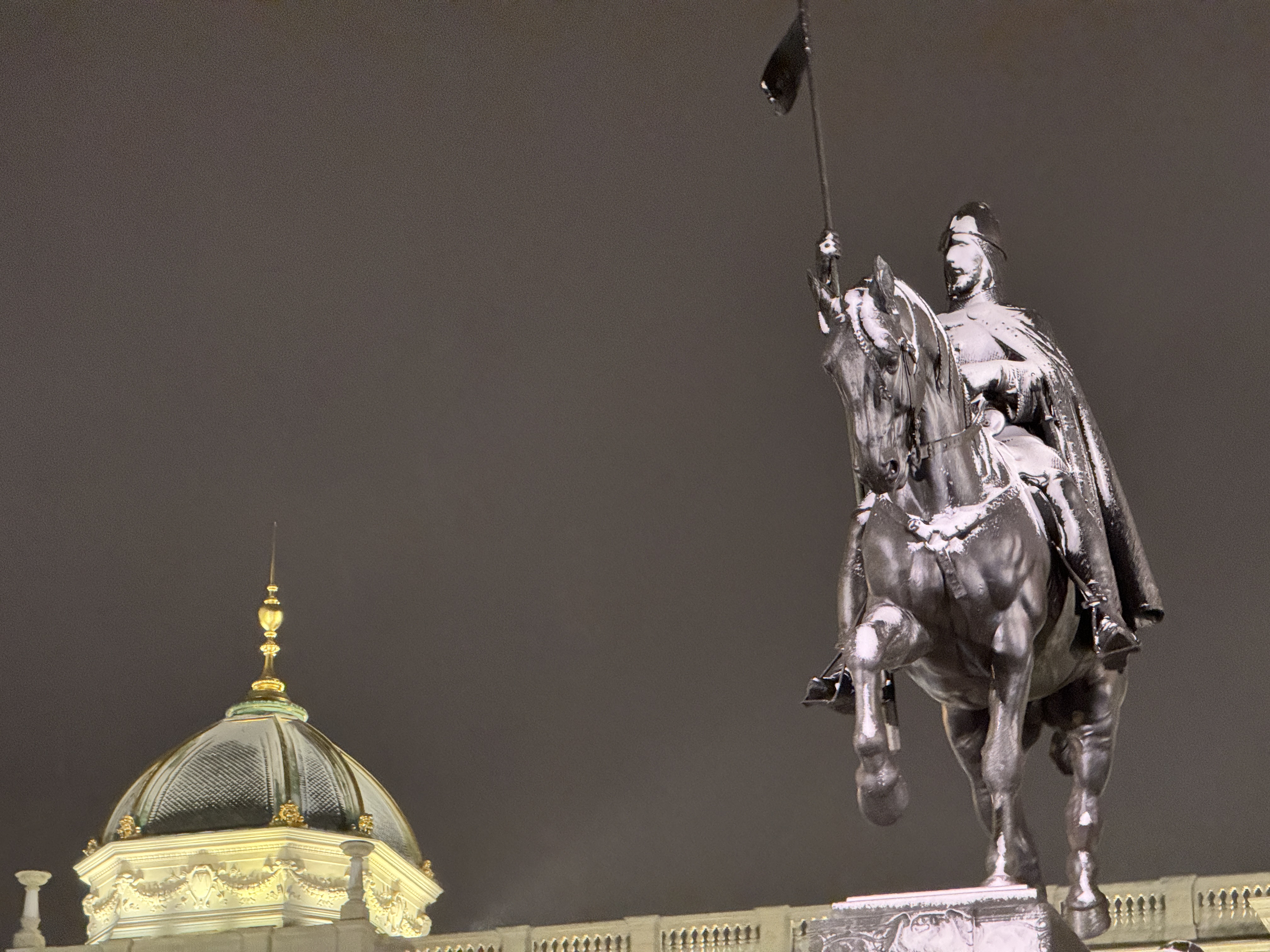 equestrian statue night sky