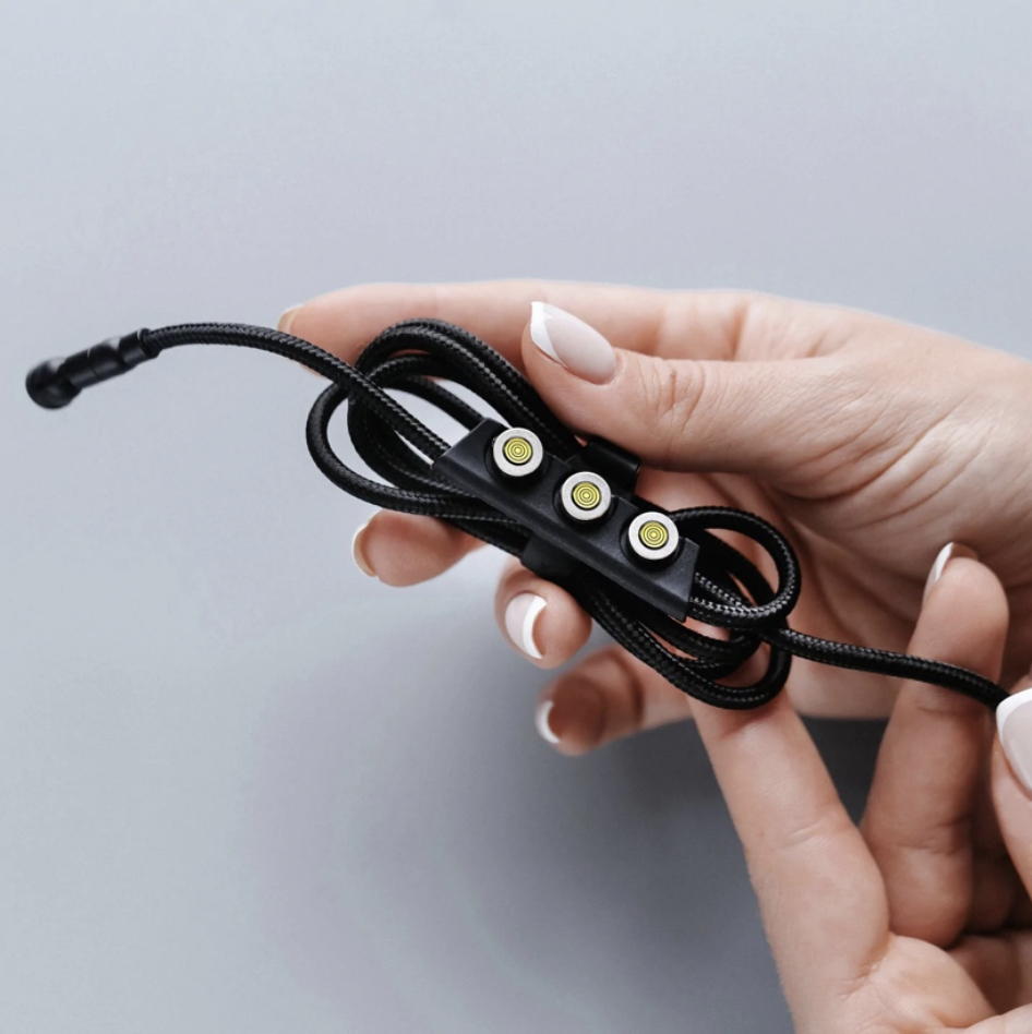 hands holding cable organizer