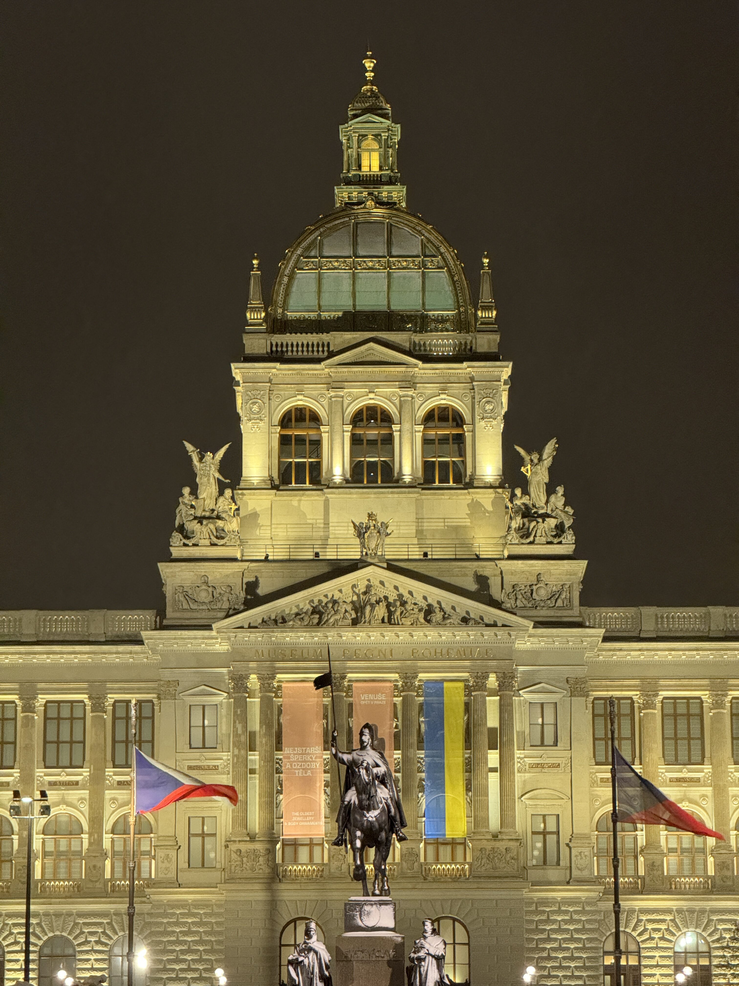nighttime building statue view