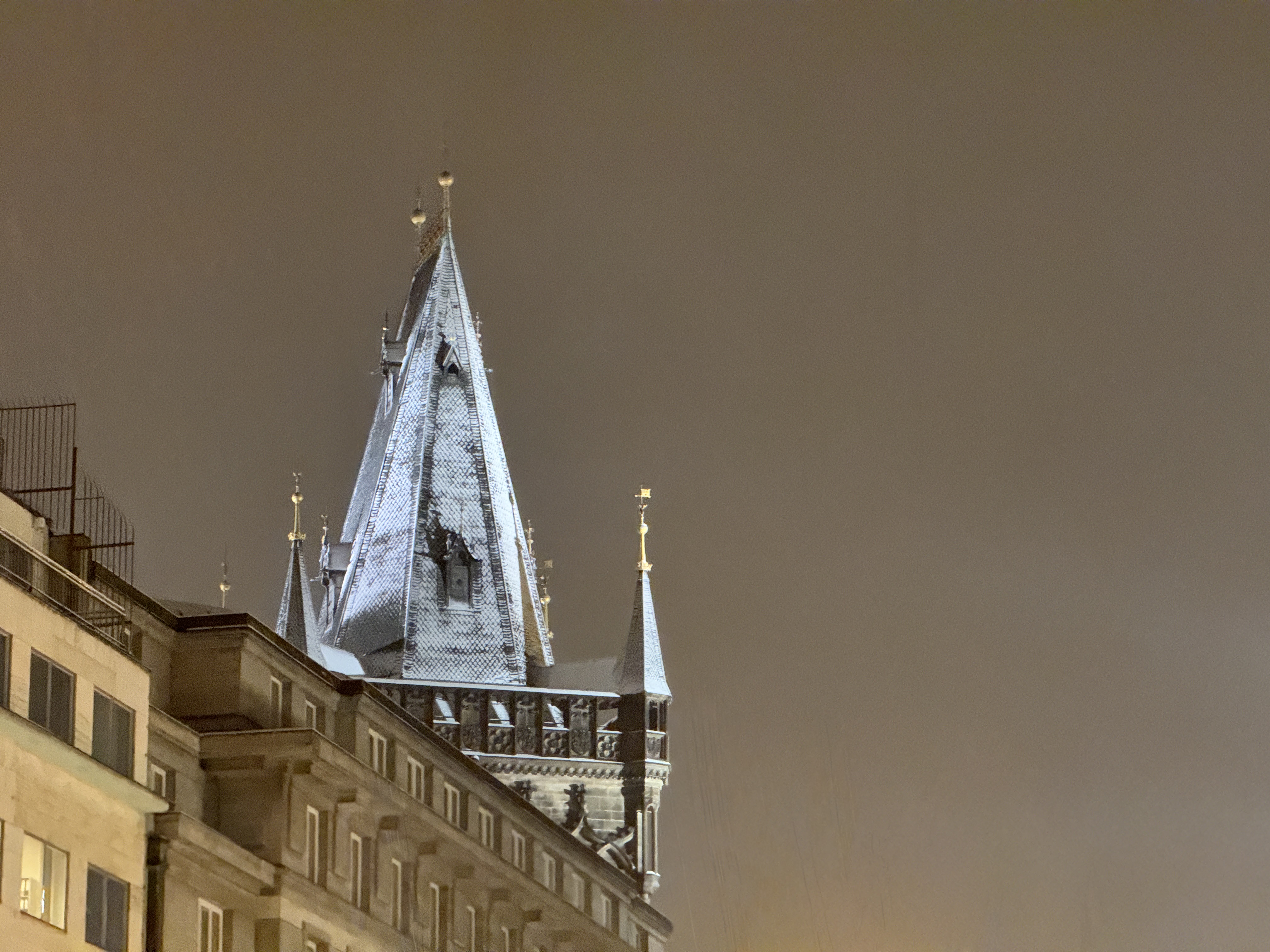 pointed tower rooftop night