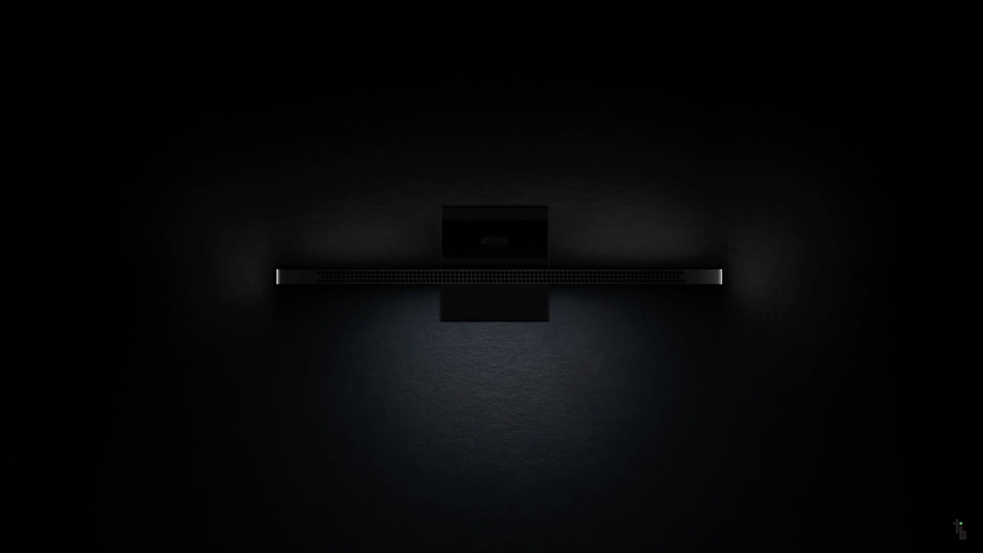 black soundbar on wall