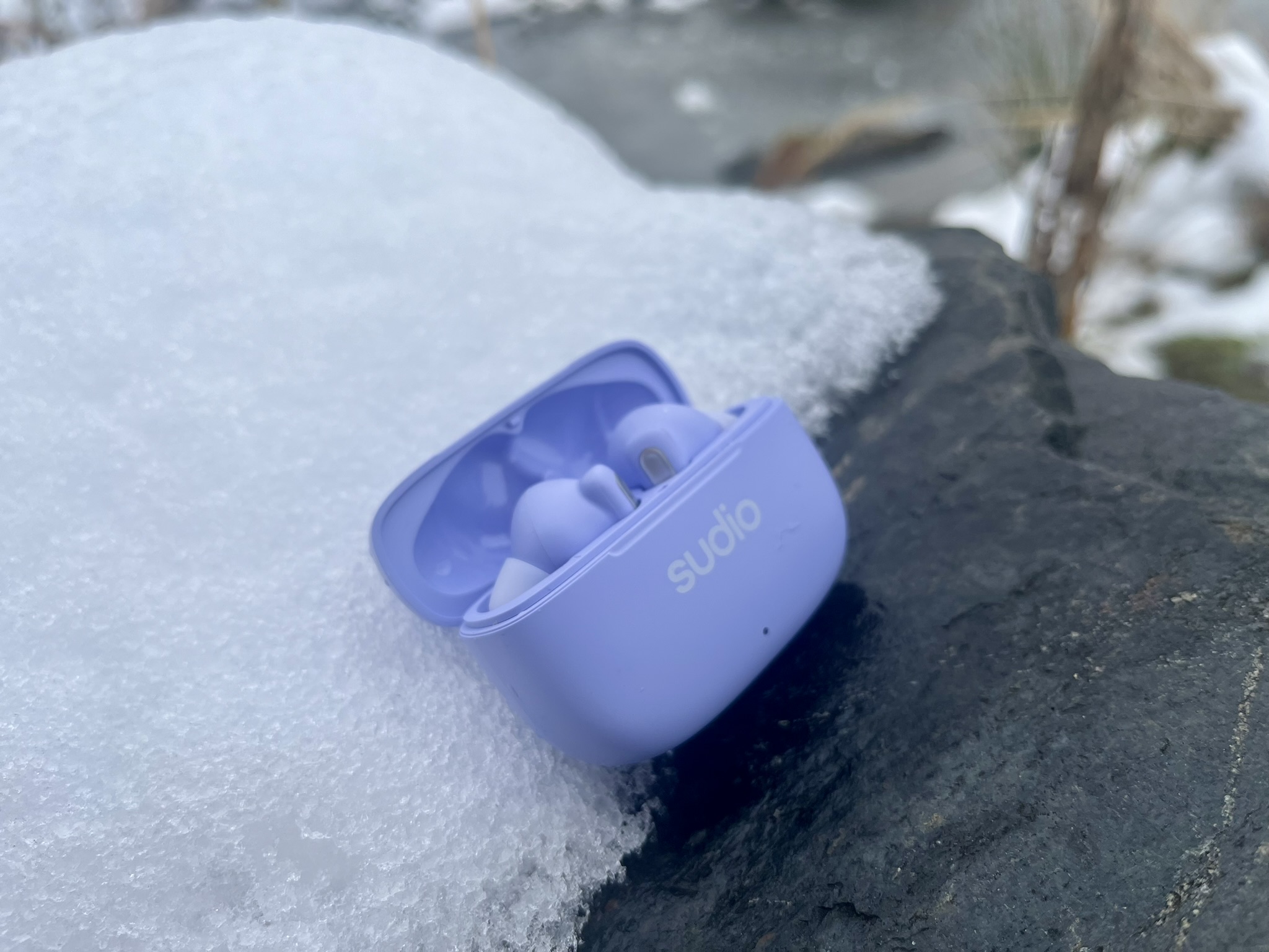 lavender earbuds case open