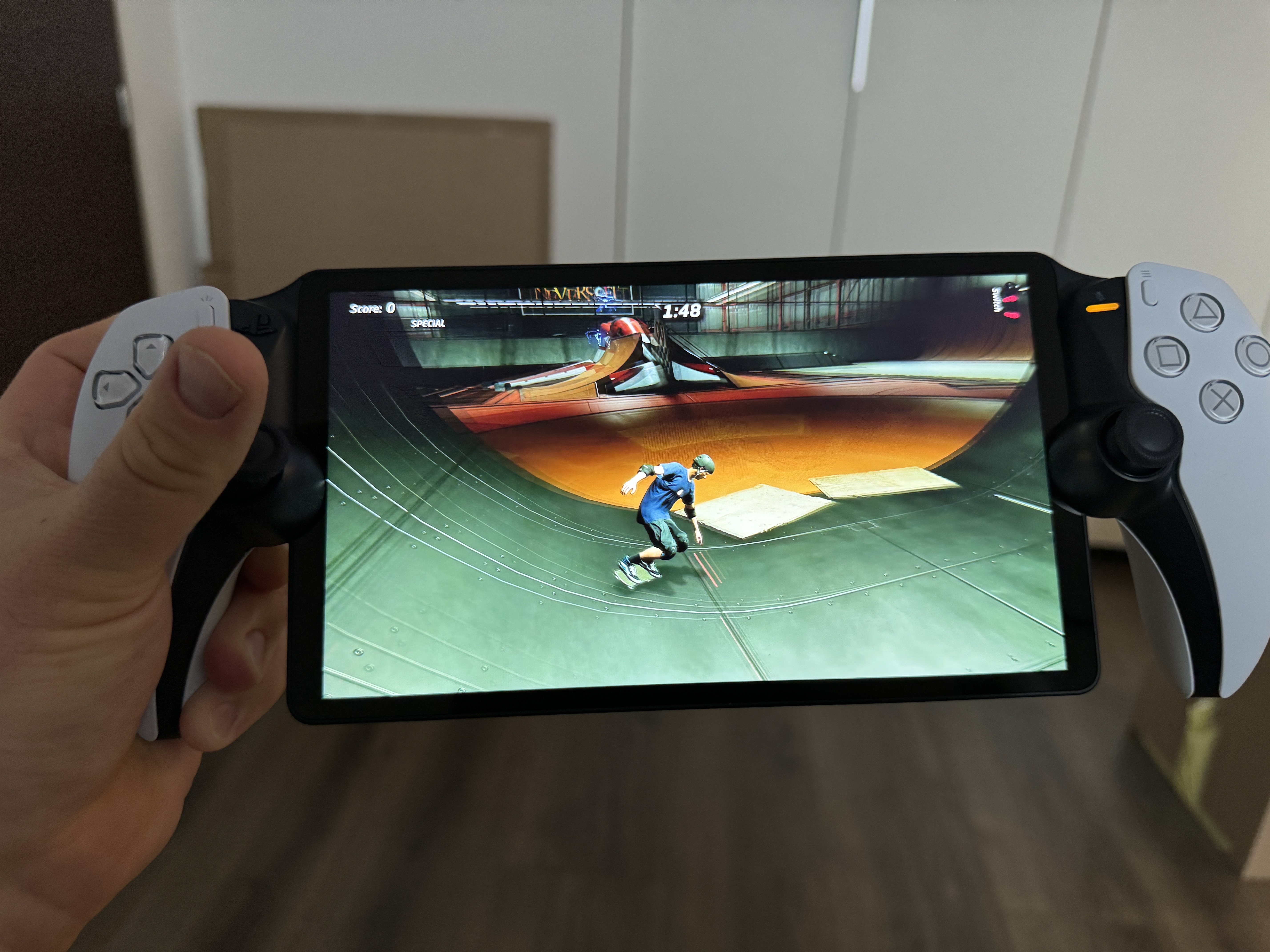 playstation handheld device skateboarding action