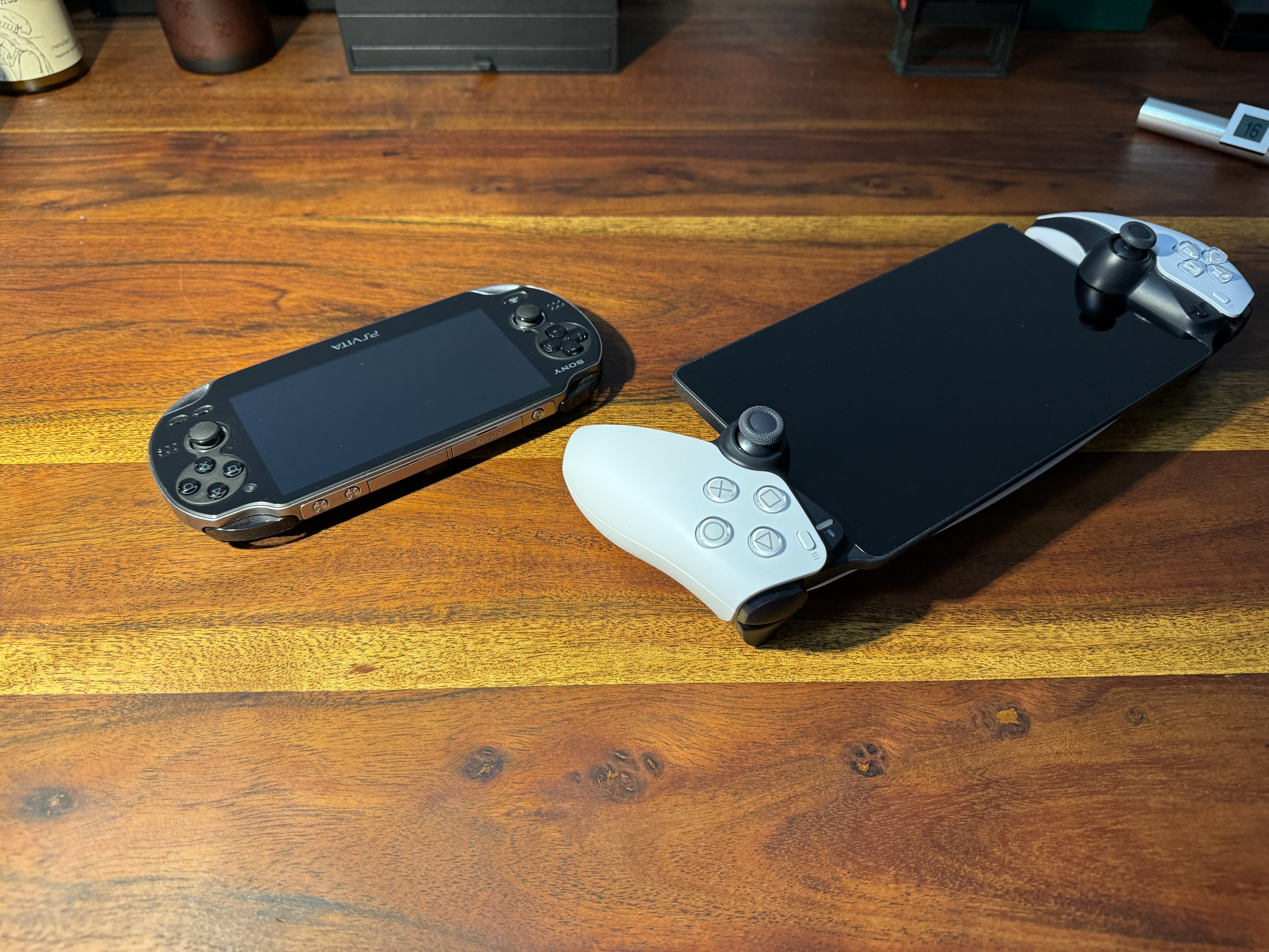 portable gaming consoles on table