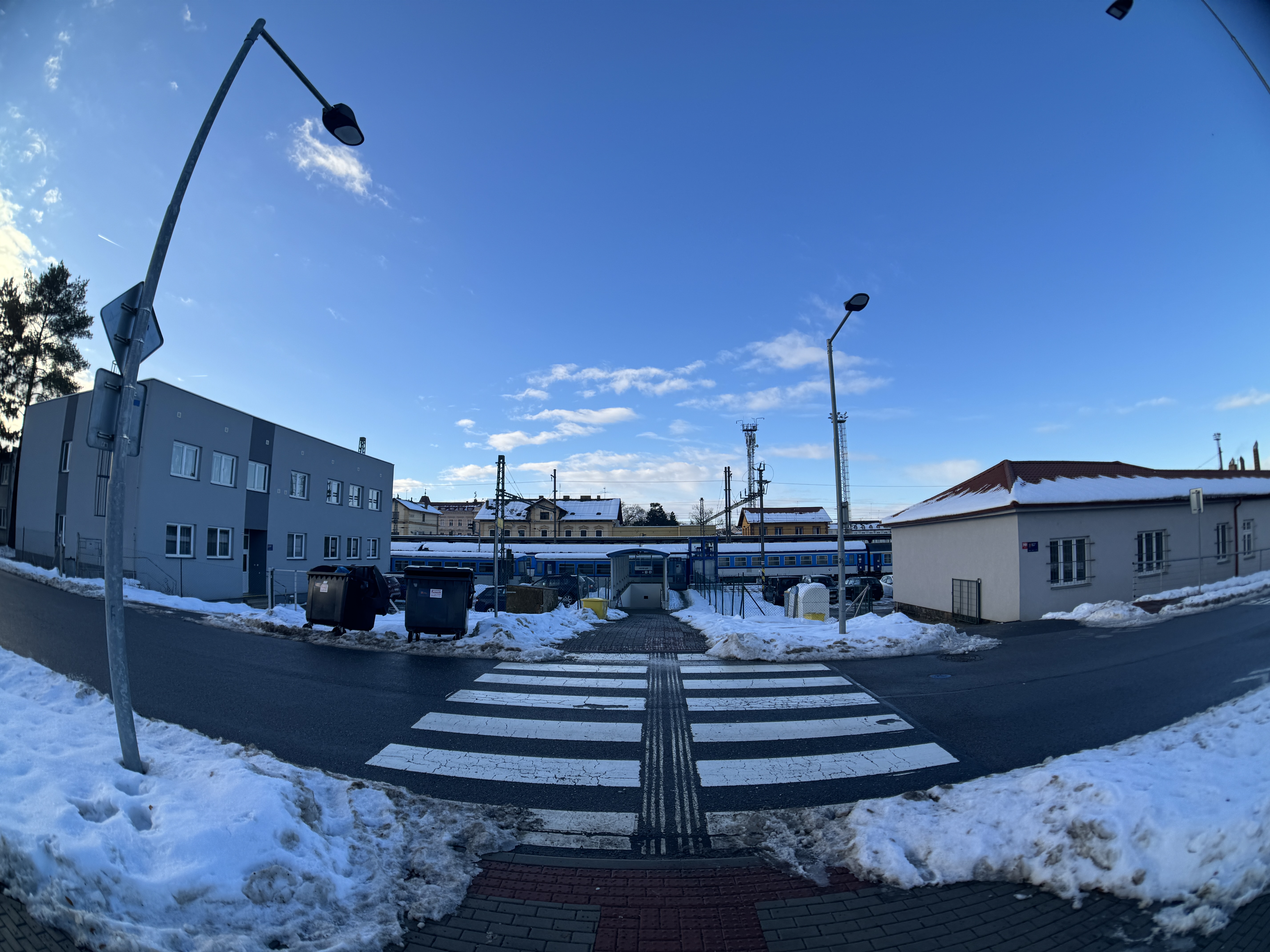 snowy crosswalk and buildings
