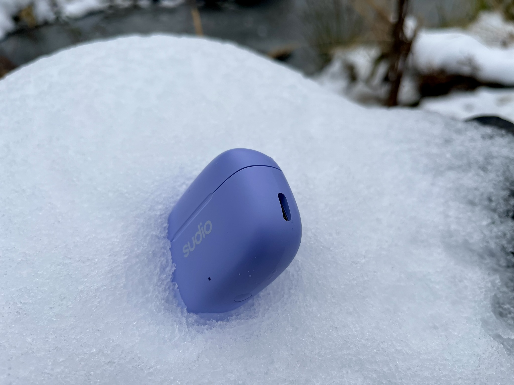 wireless earbuds in snow