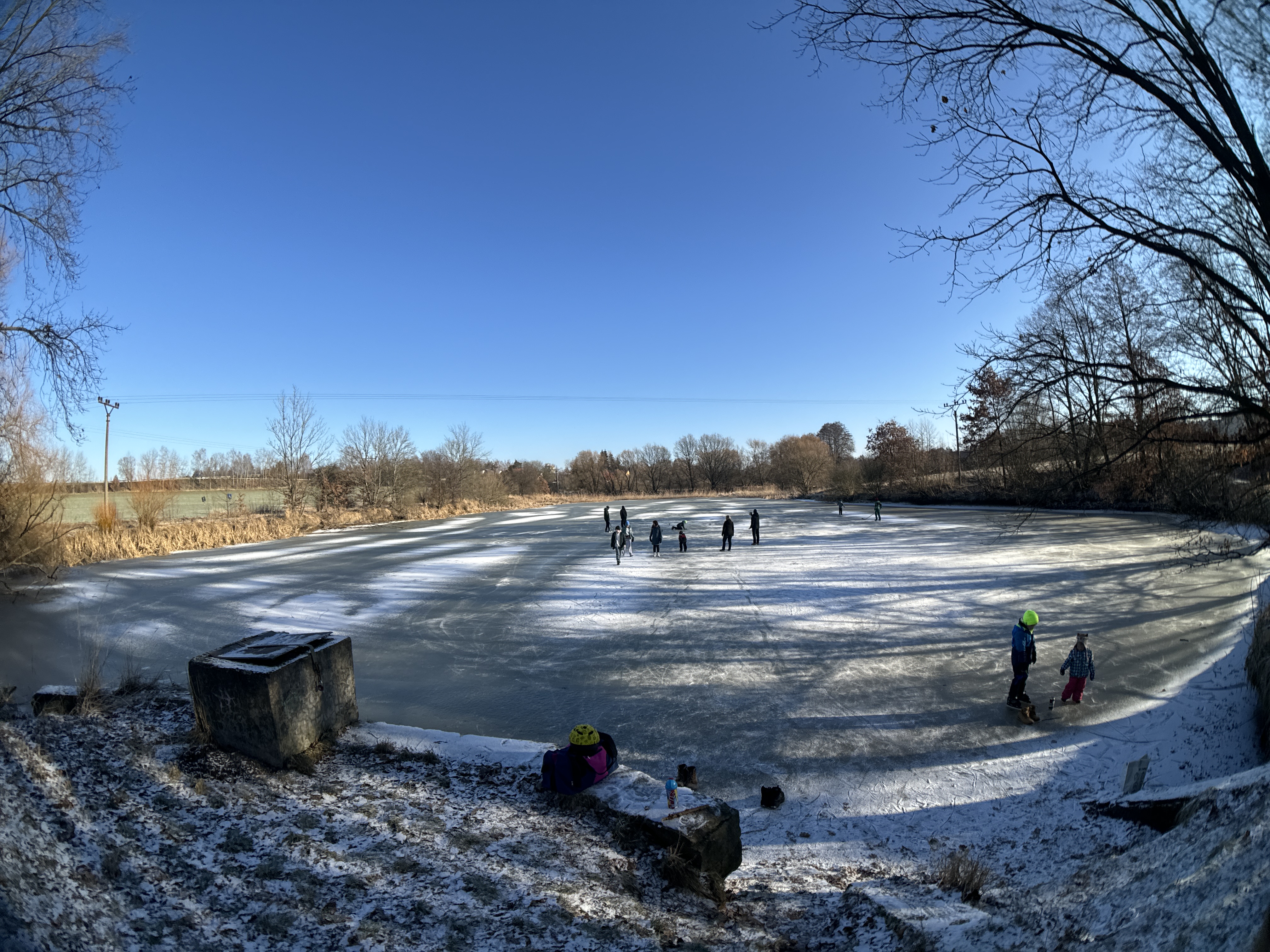 frozen lake people skating