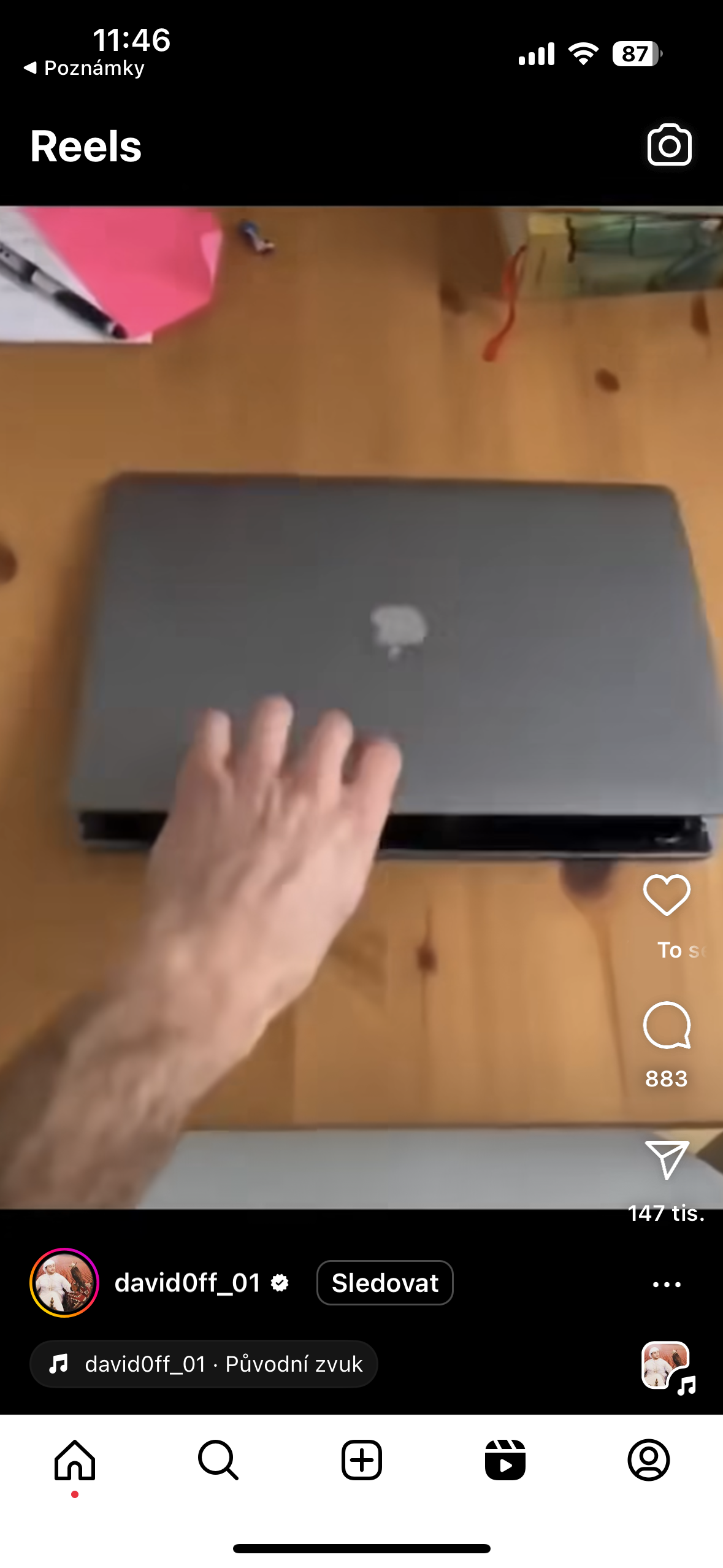 hand opening laptop