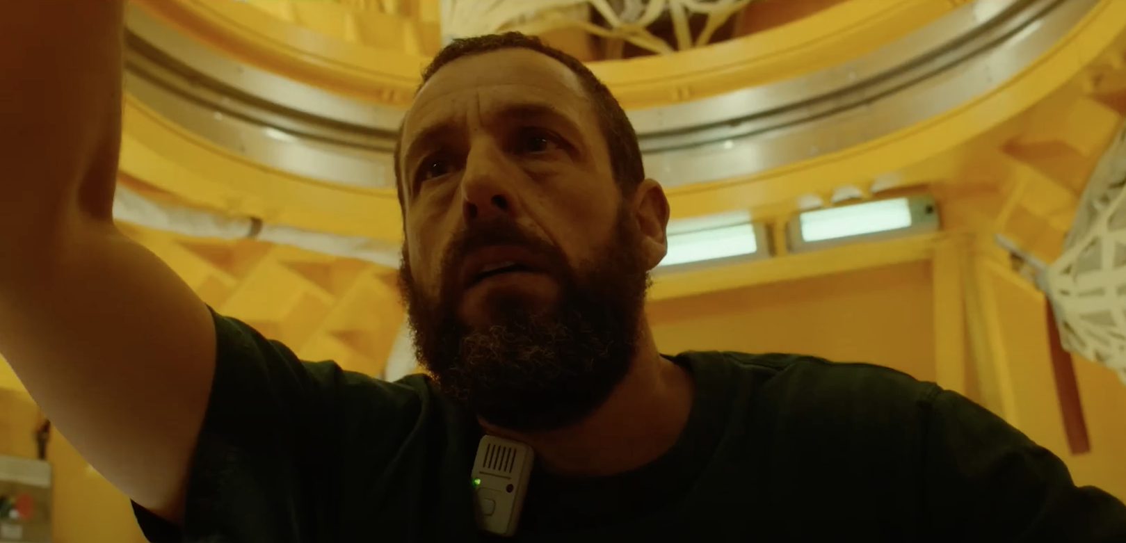 person in yellow room