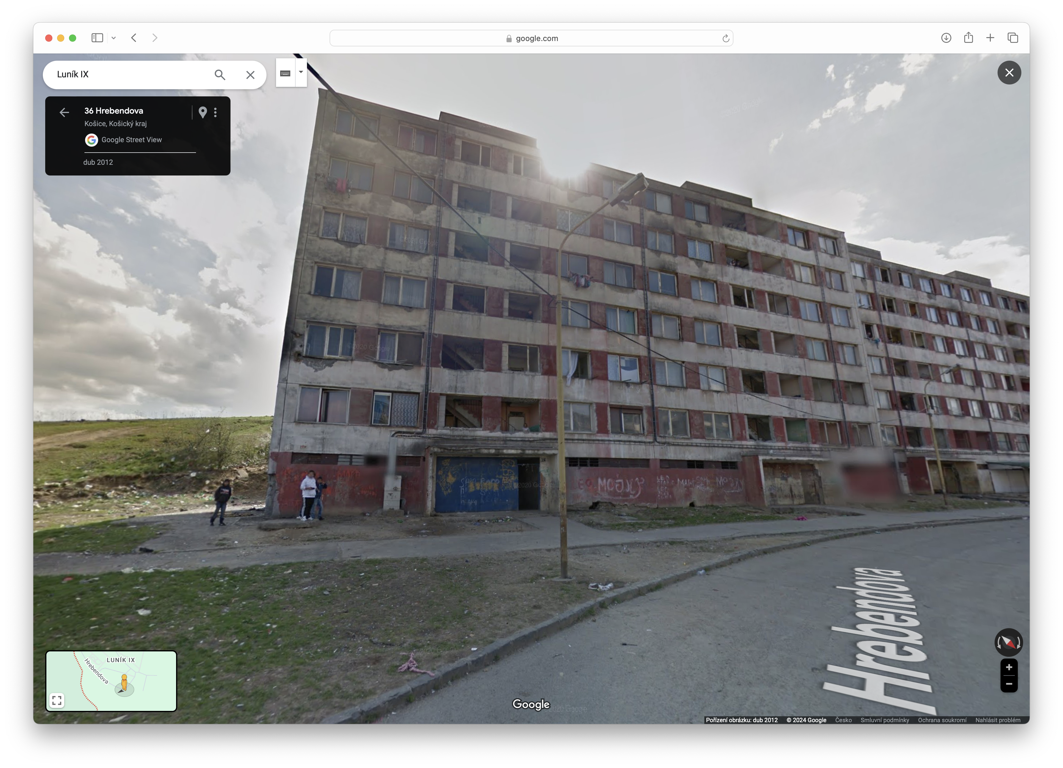 abandoned apartment building street view