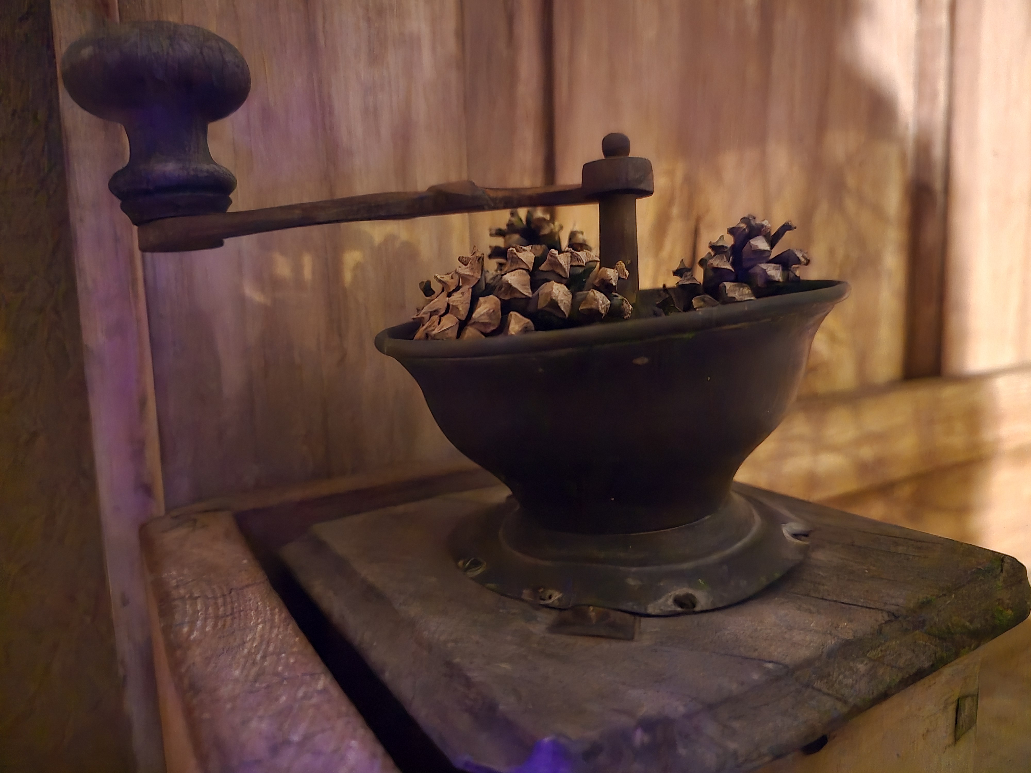 antique coffee grinder pinecones