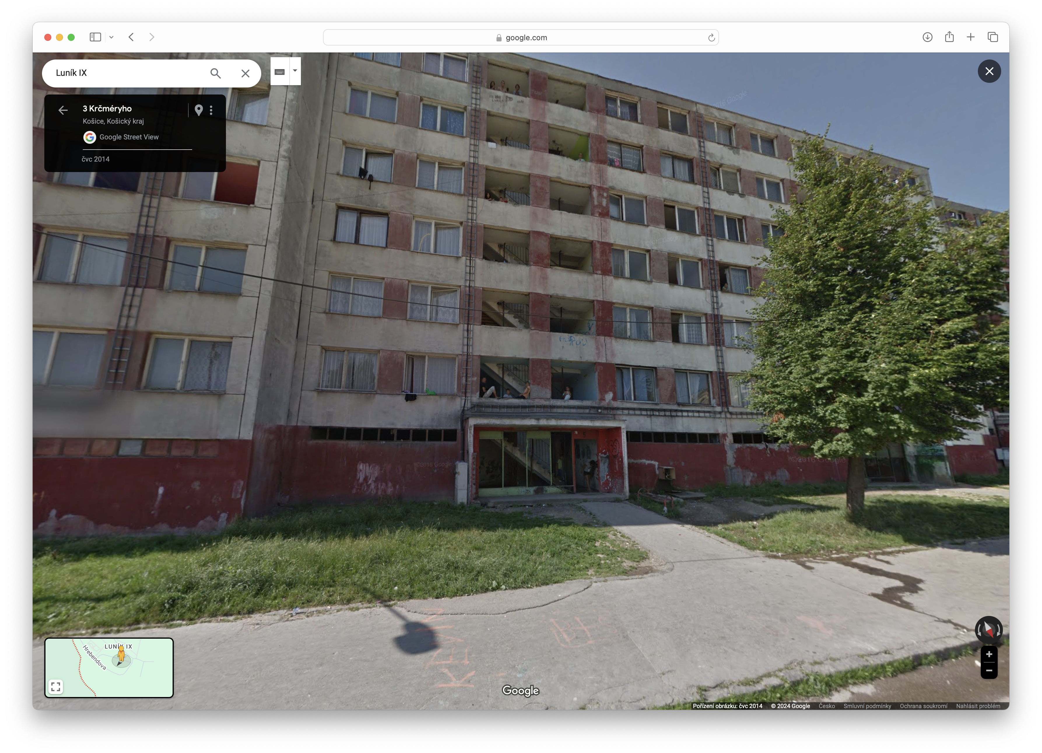 apartment building with tree
