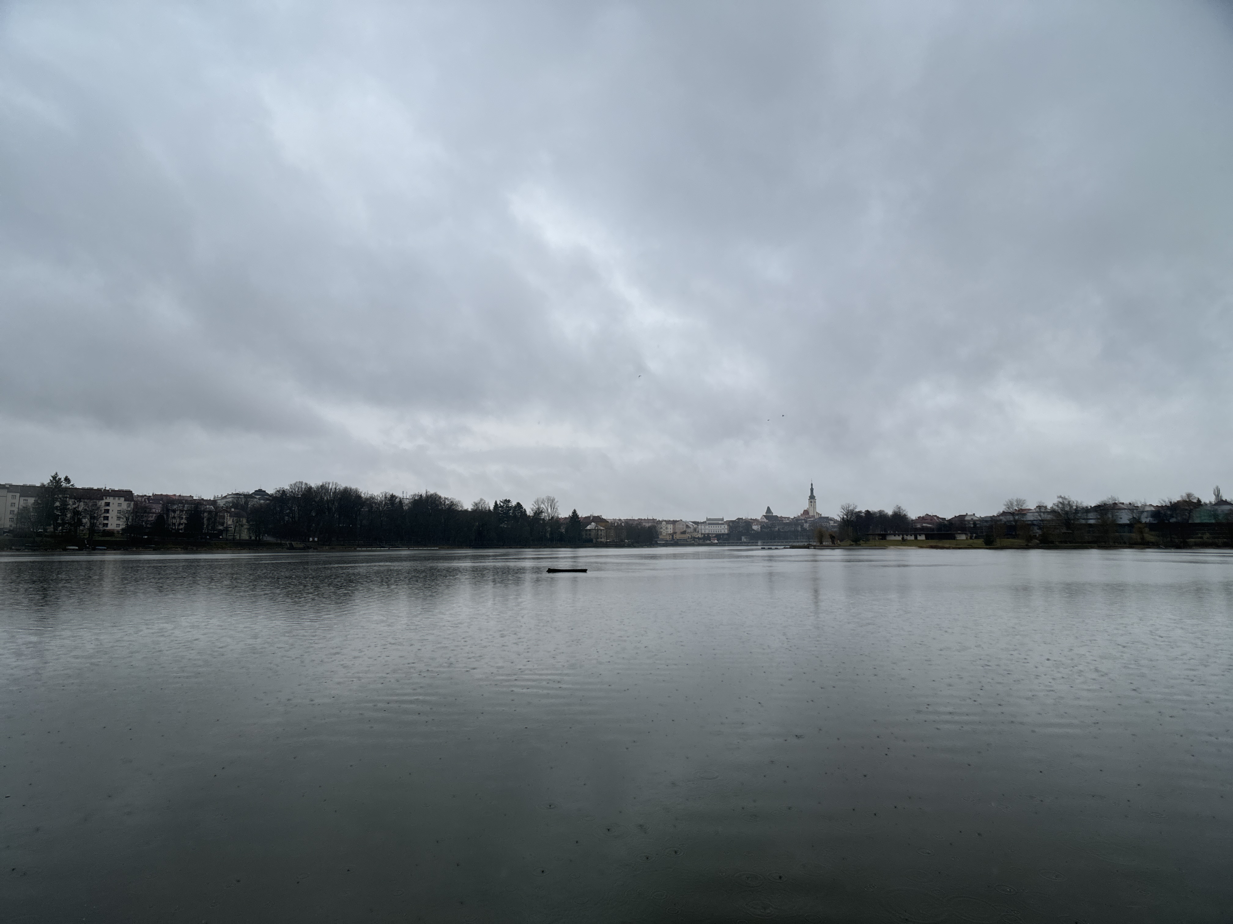 calm lake overcast skyline