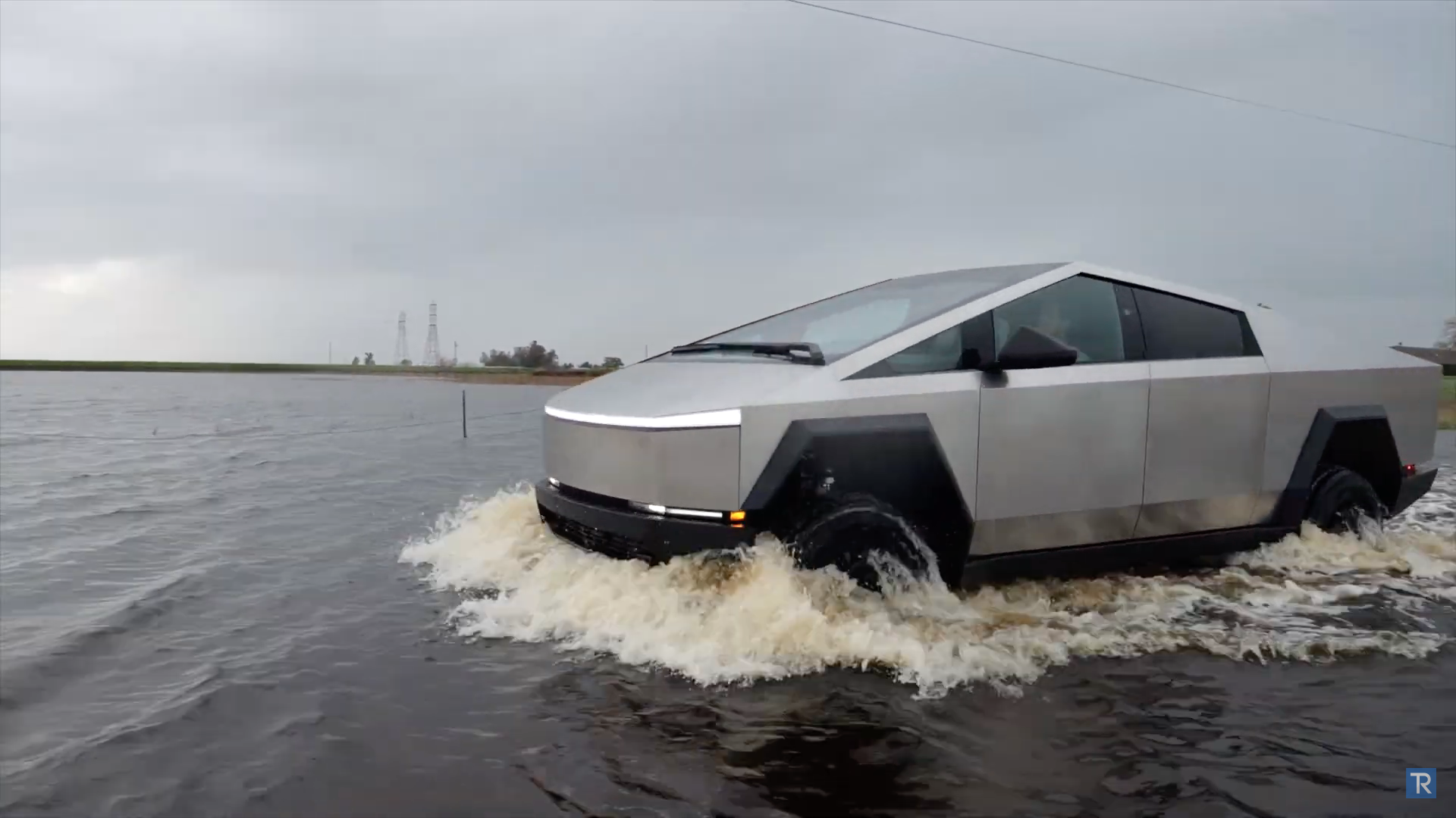 cybertruck driving through water