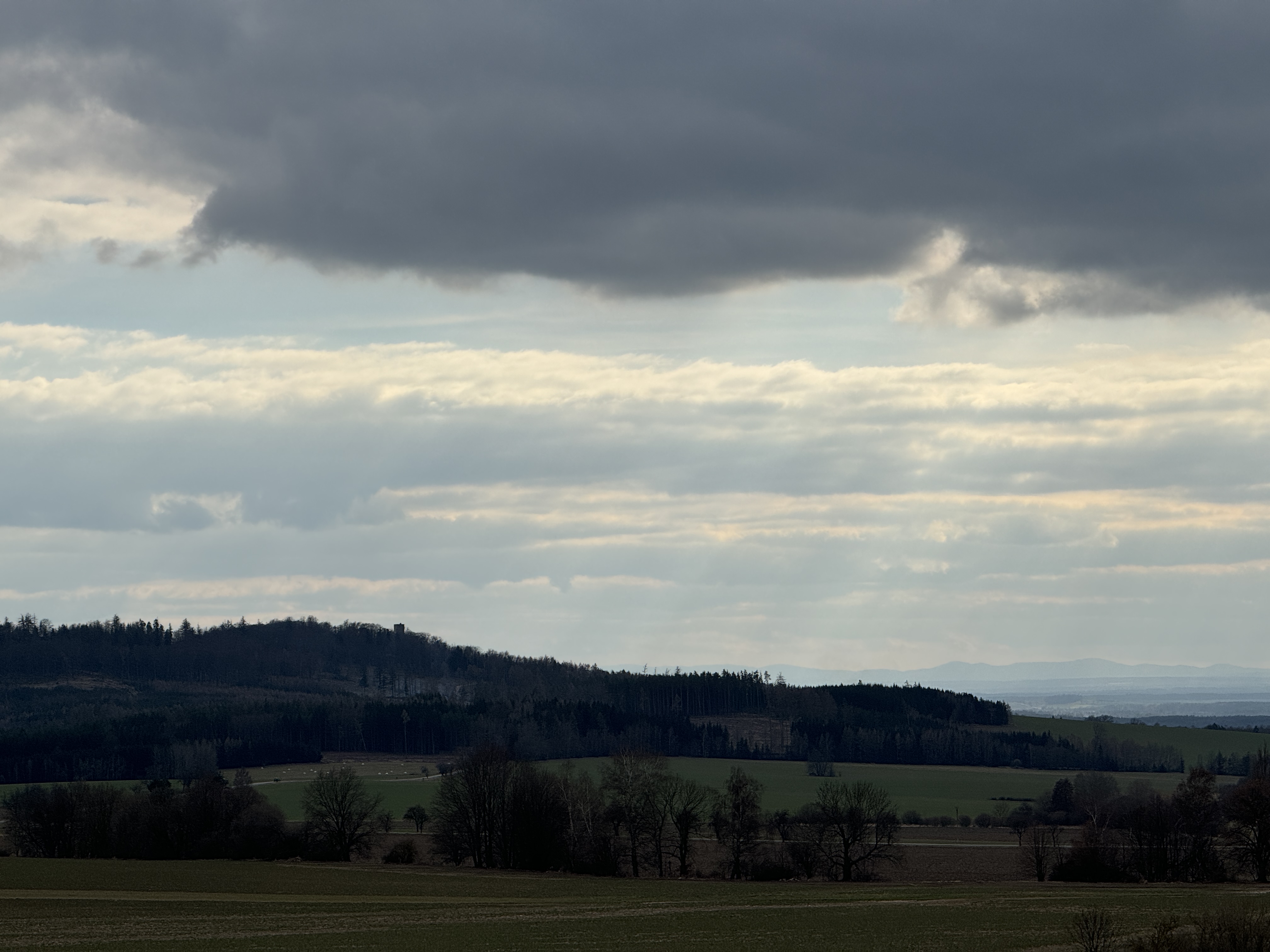 expansive landscape under clouds