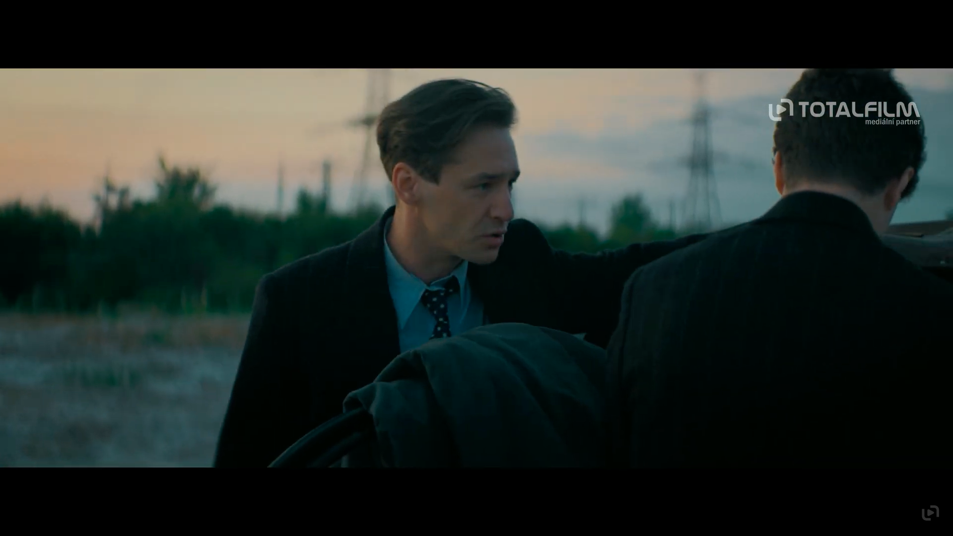 film scene two men talking