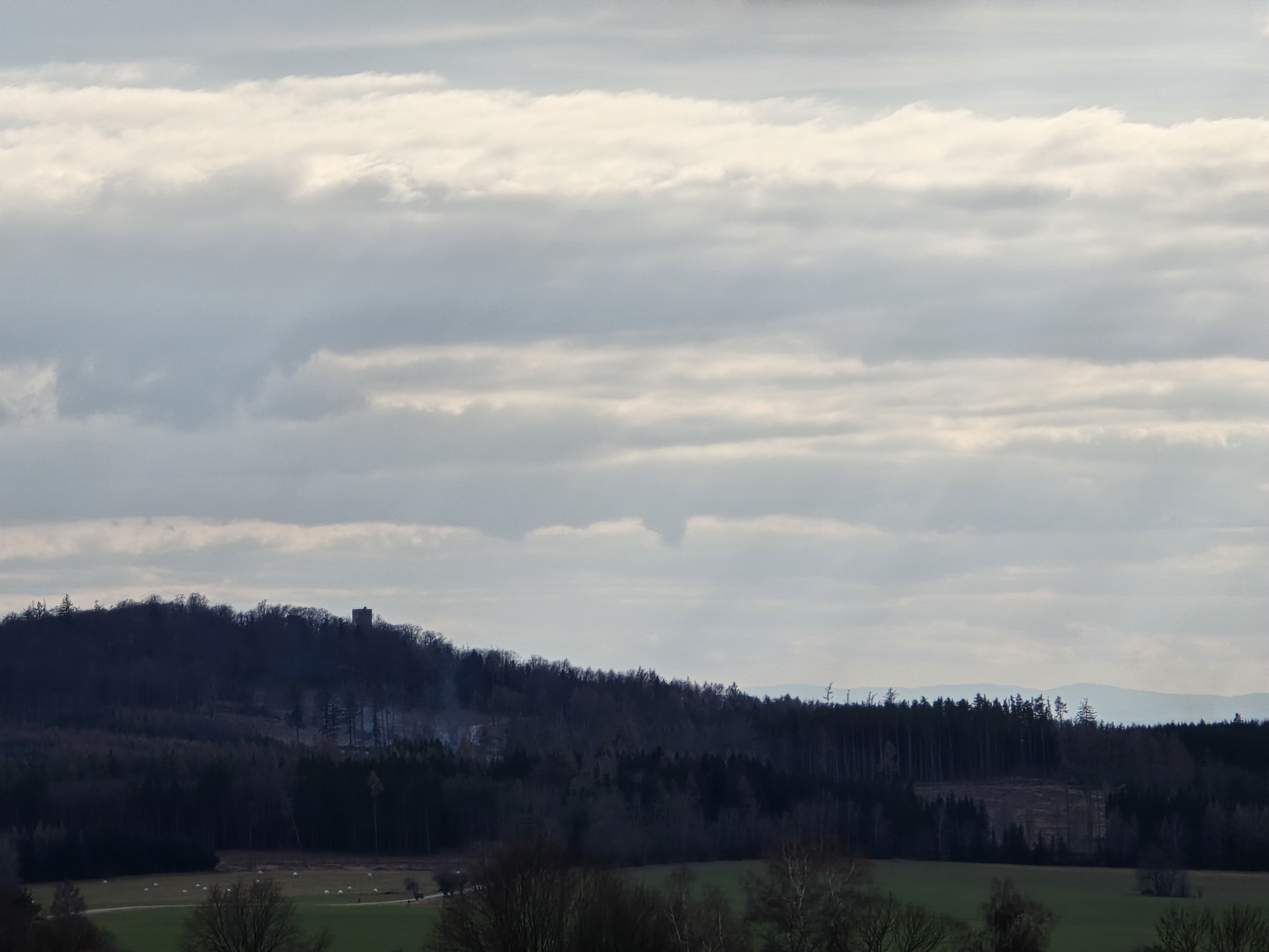 hilly landscape with tower