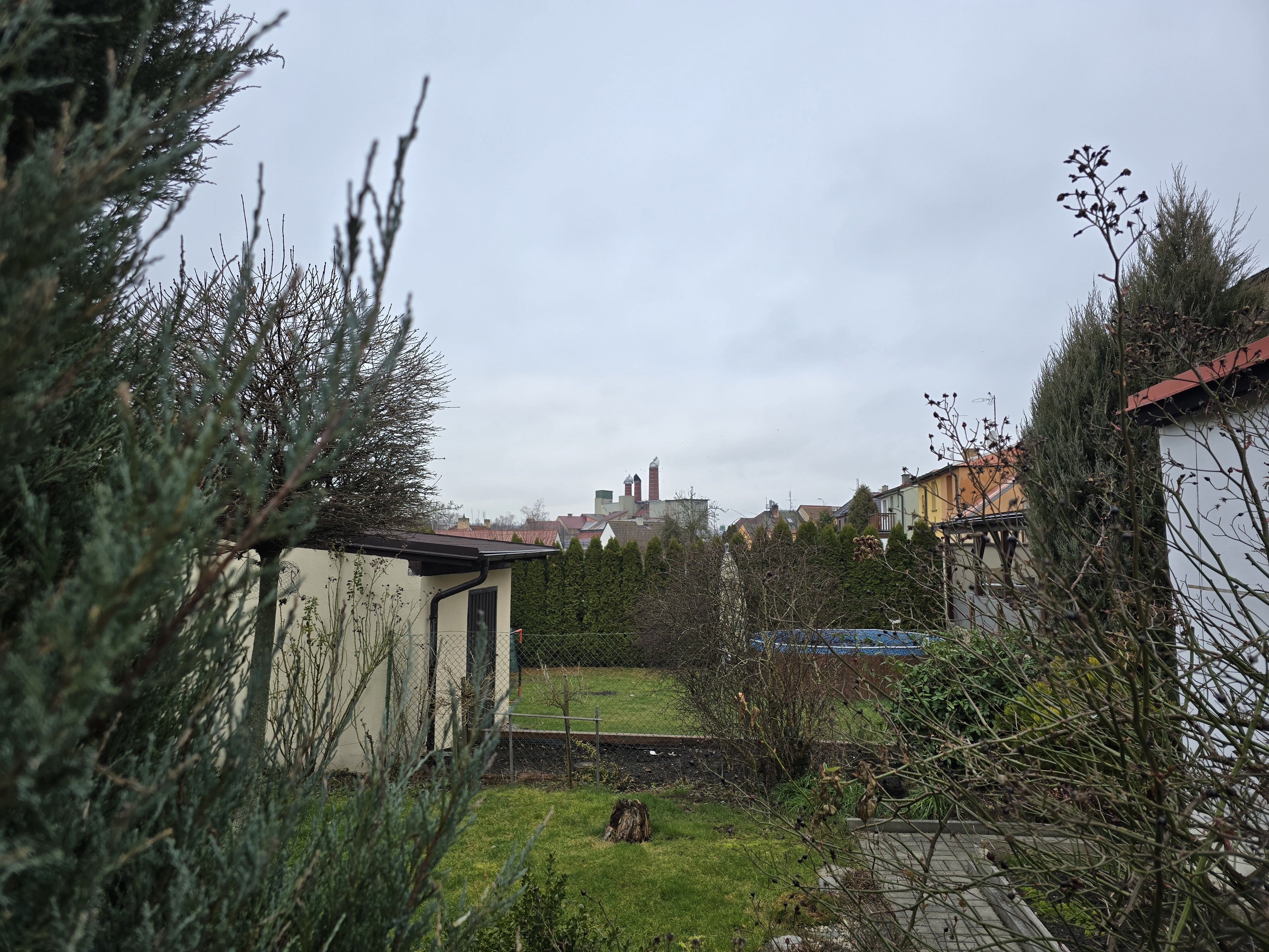industrial chimneys in distance