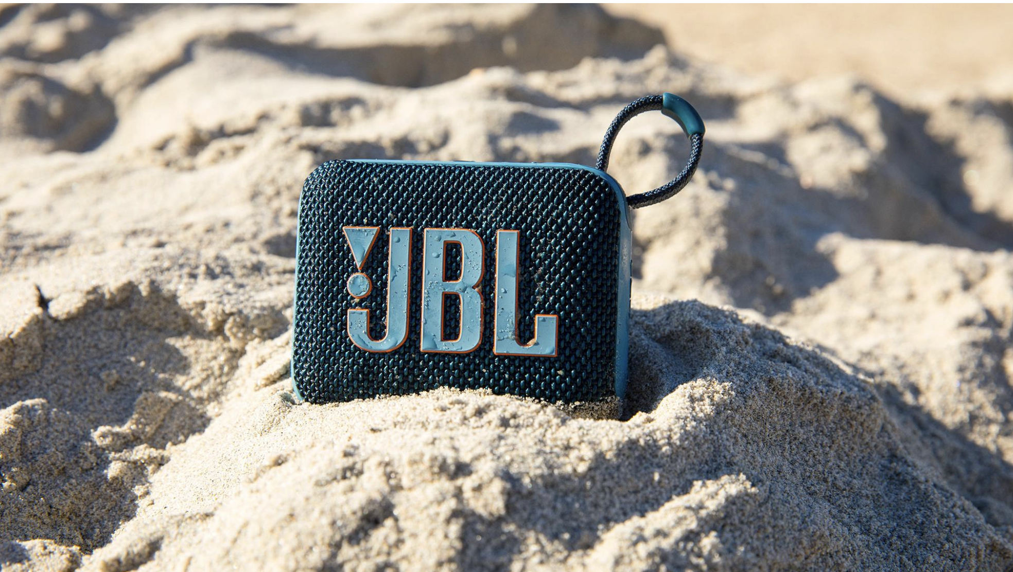 jbl speaker on sand