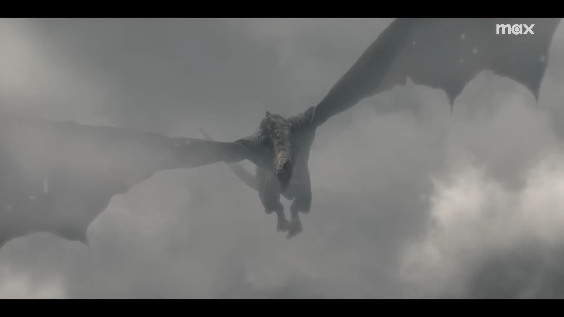 dragon flying in clouds