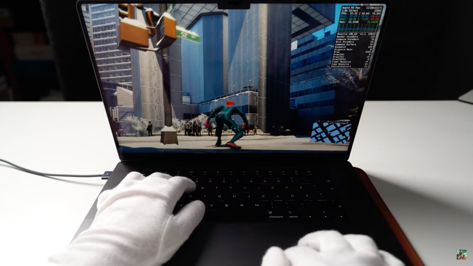 laptop gaming gloved hands