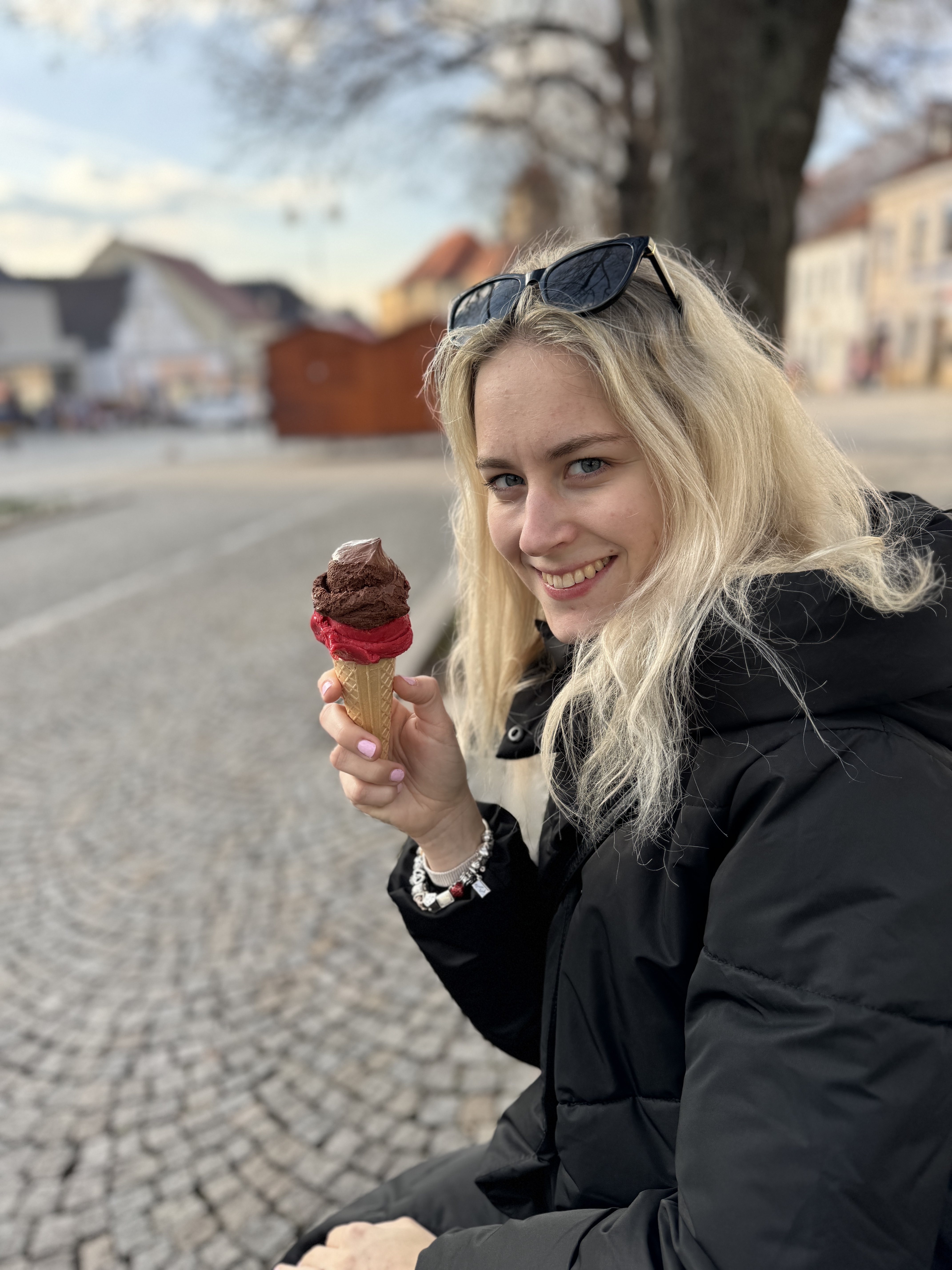 person holding ice cream cone