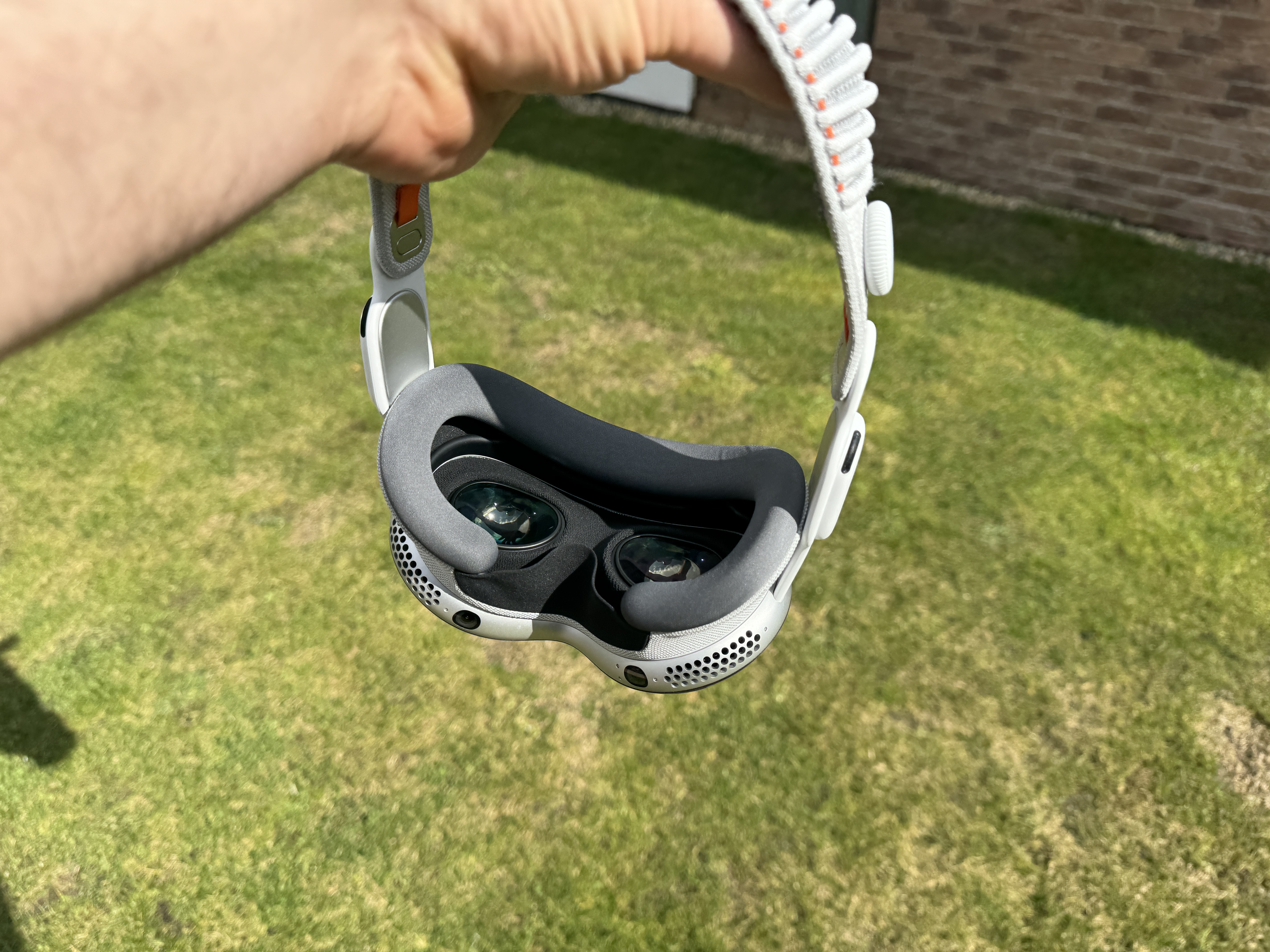vr headset held outdoors