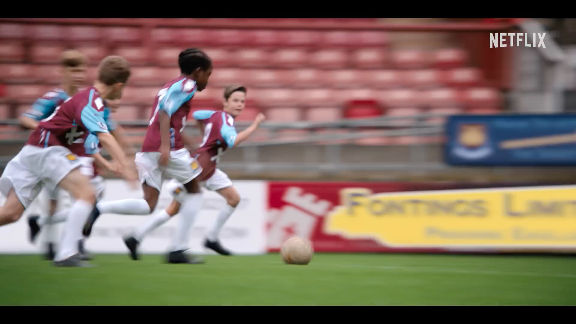 children playing soccer