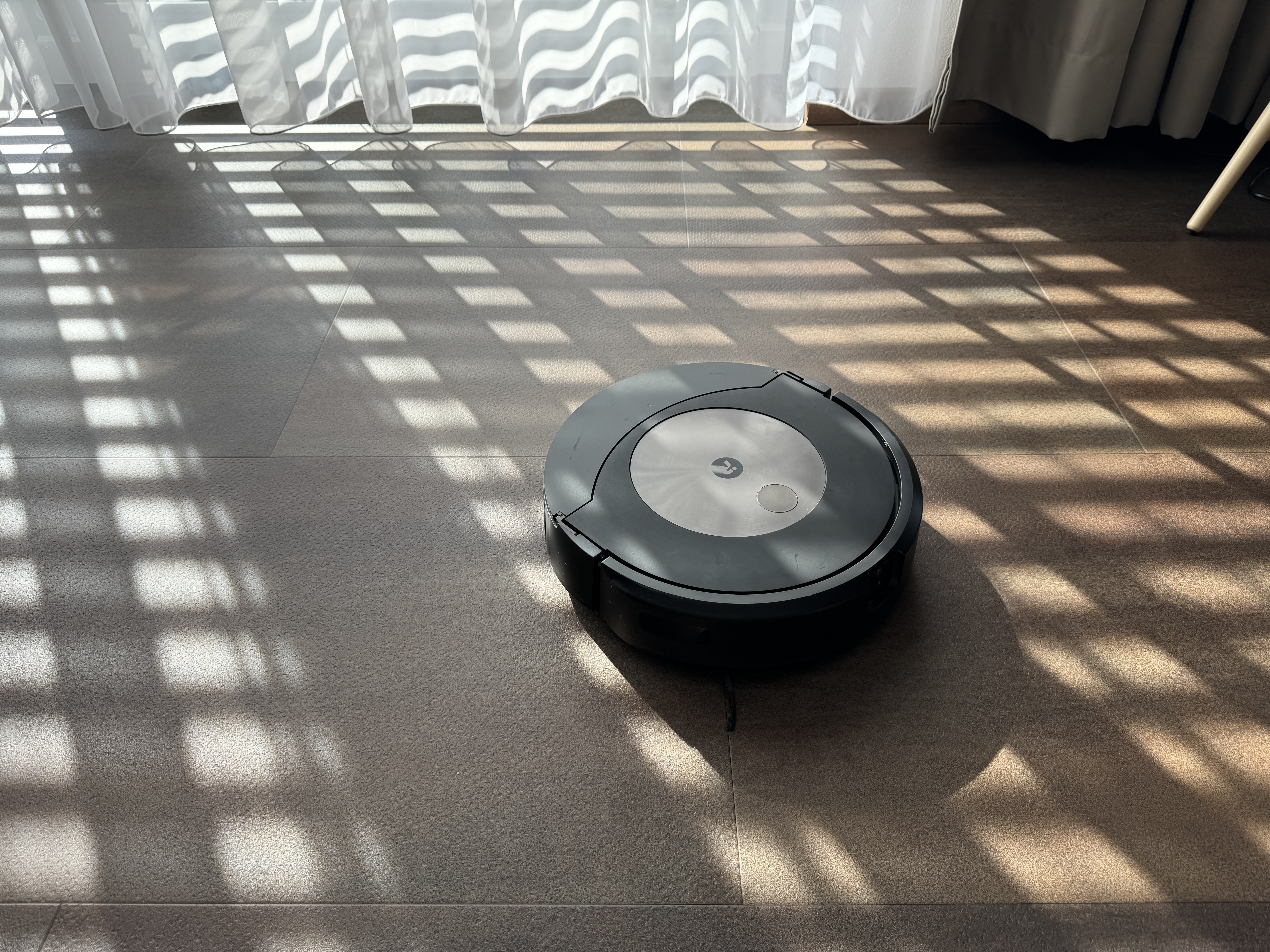 robot vacuum sunlit floor