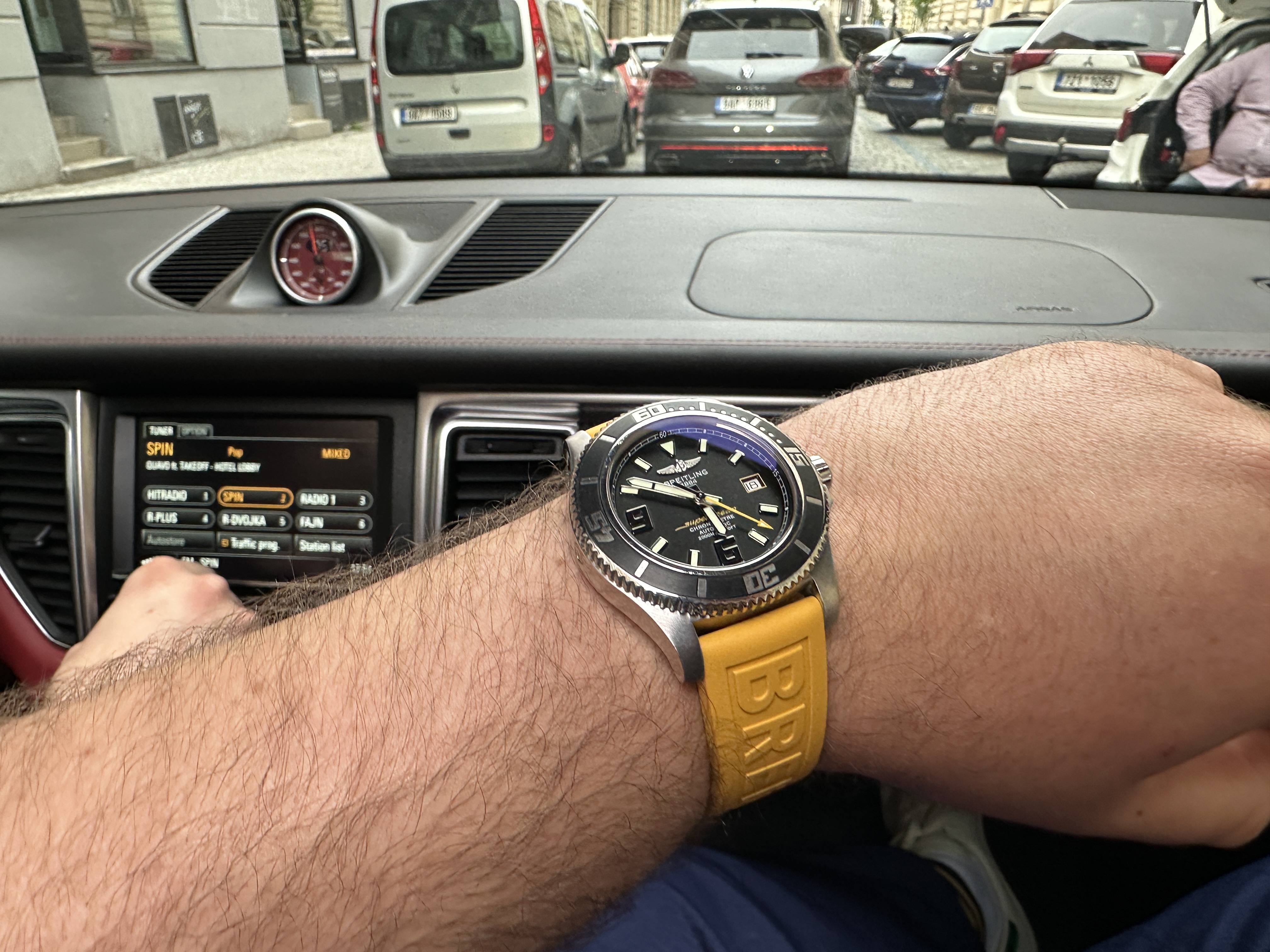 watch on wrist in car