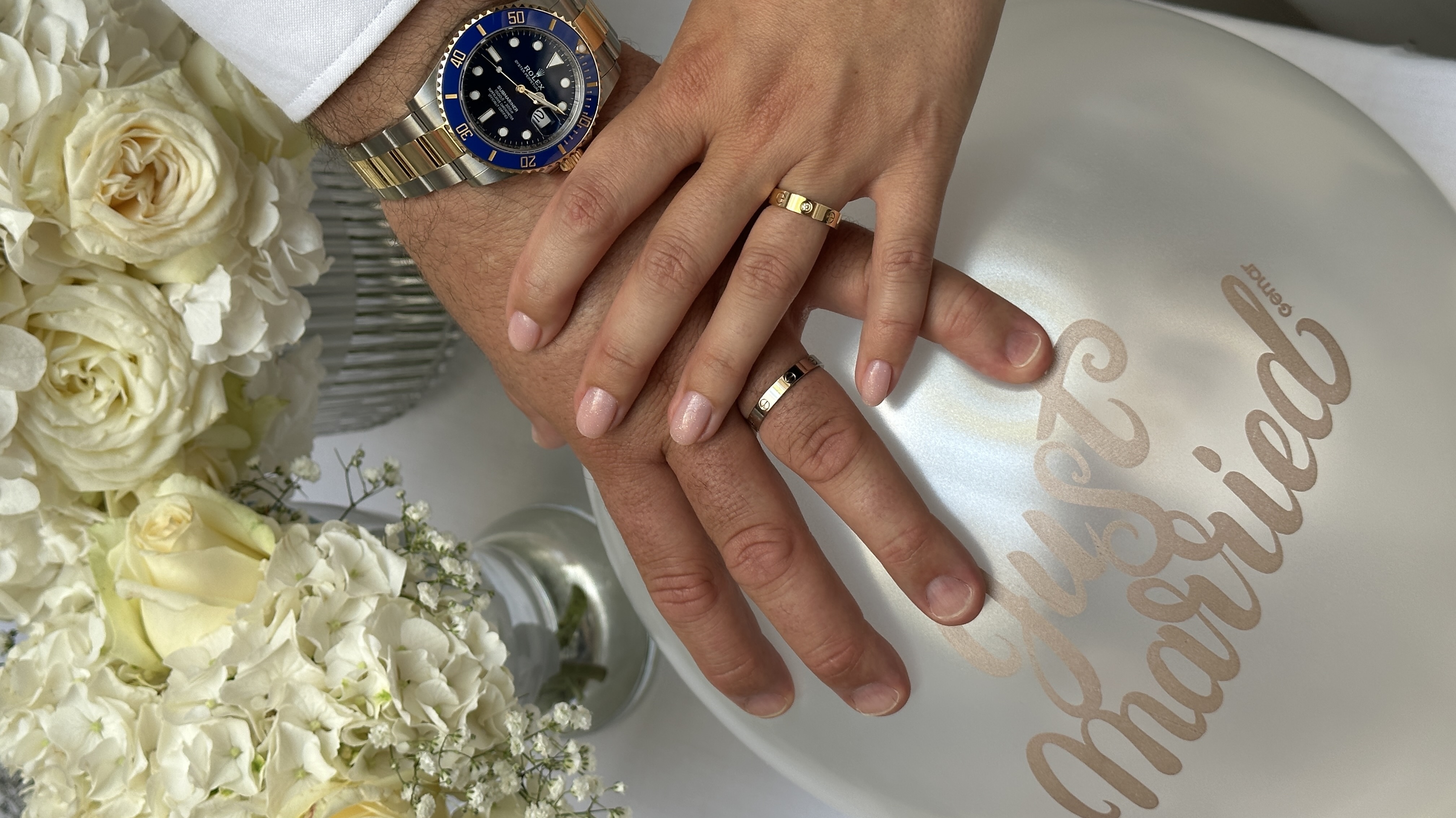 wedding rings and watch