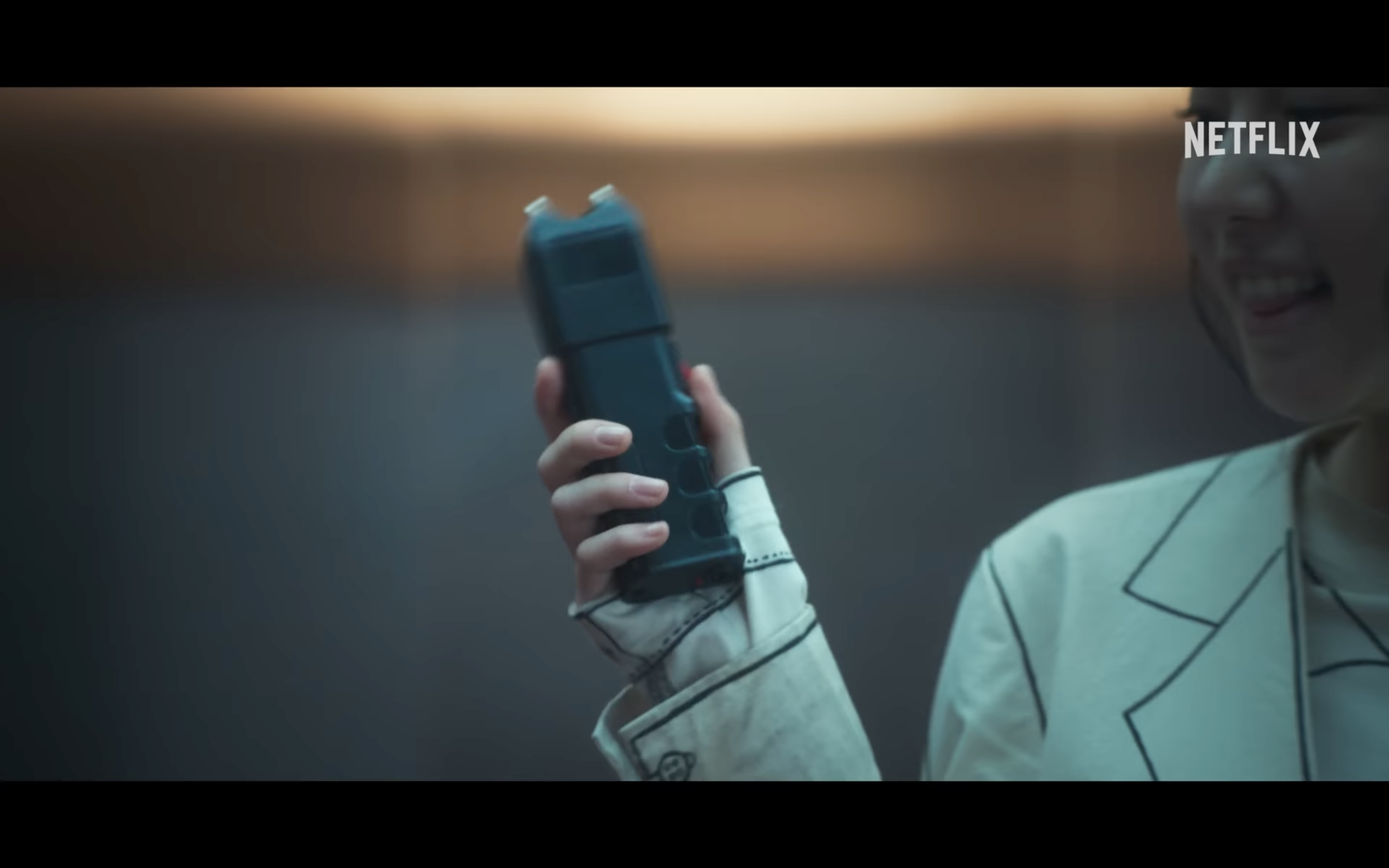 netflix scene with device