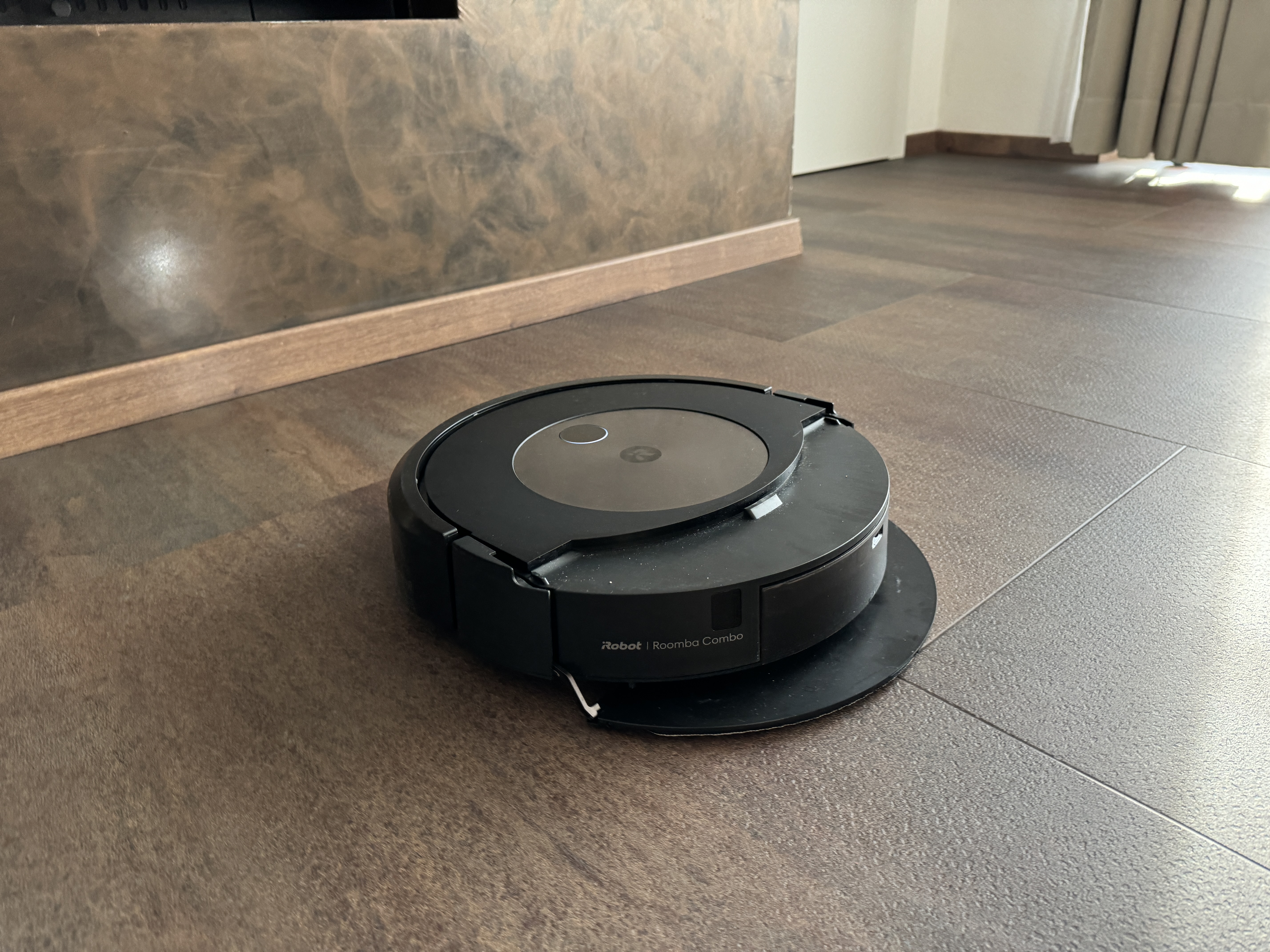 roomba near fireplace