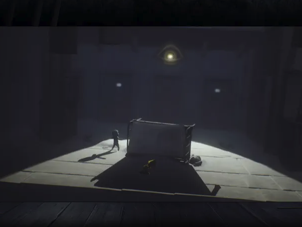 shadowy room with crate