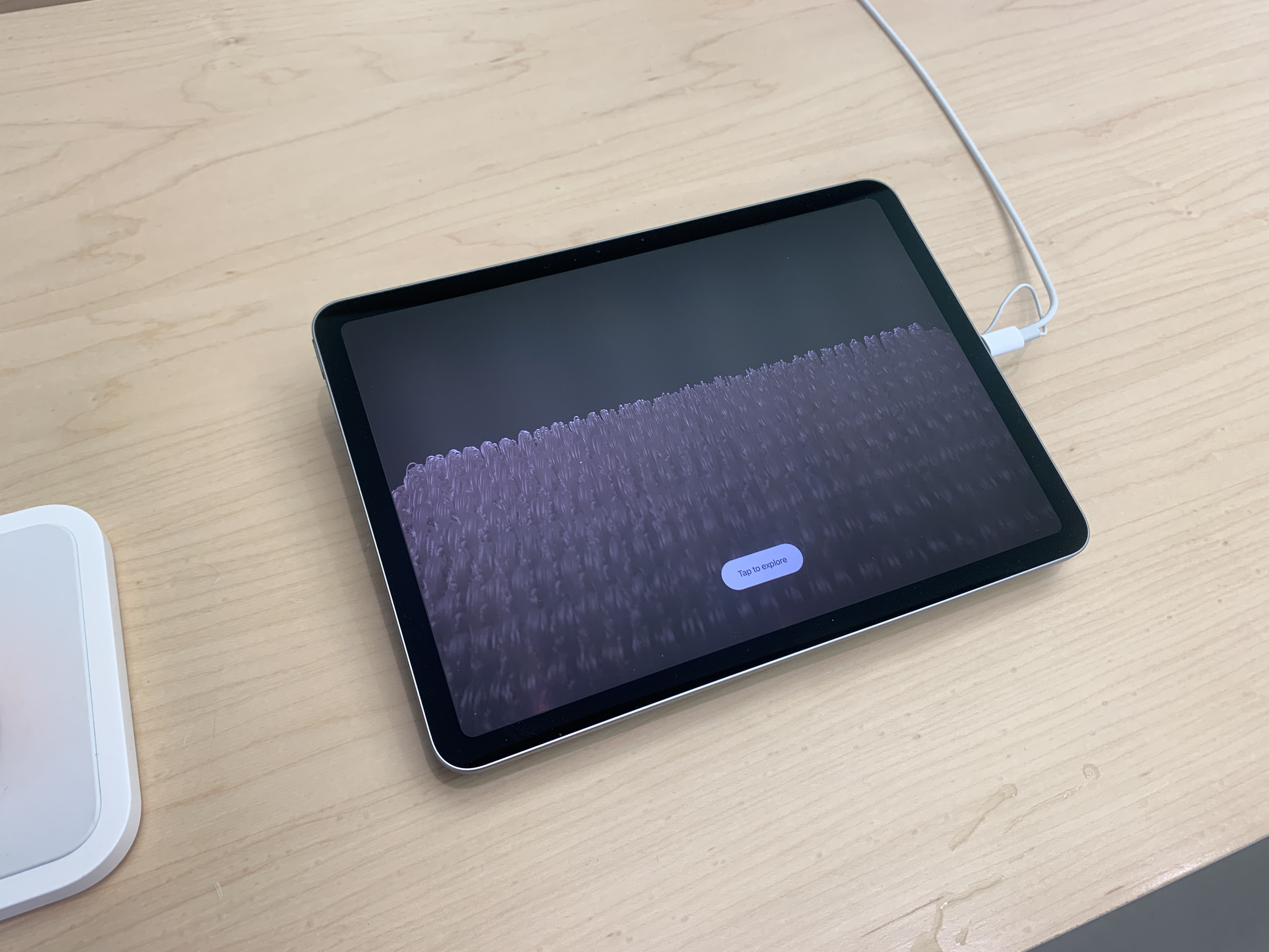 tablet on wooden table