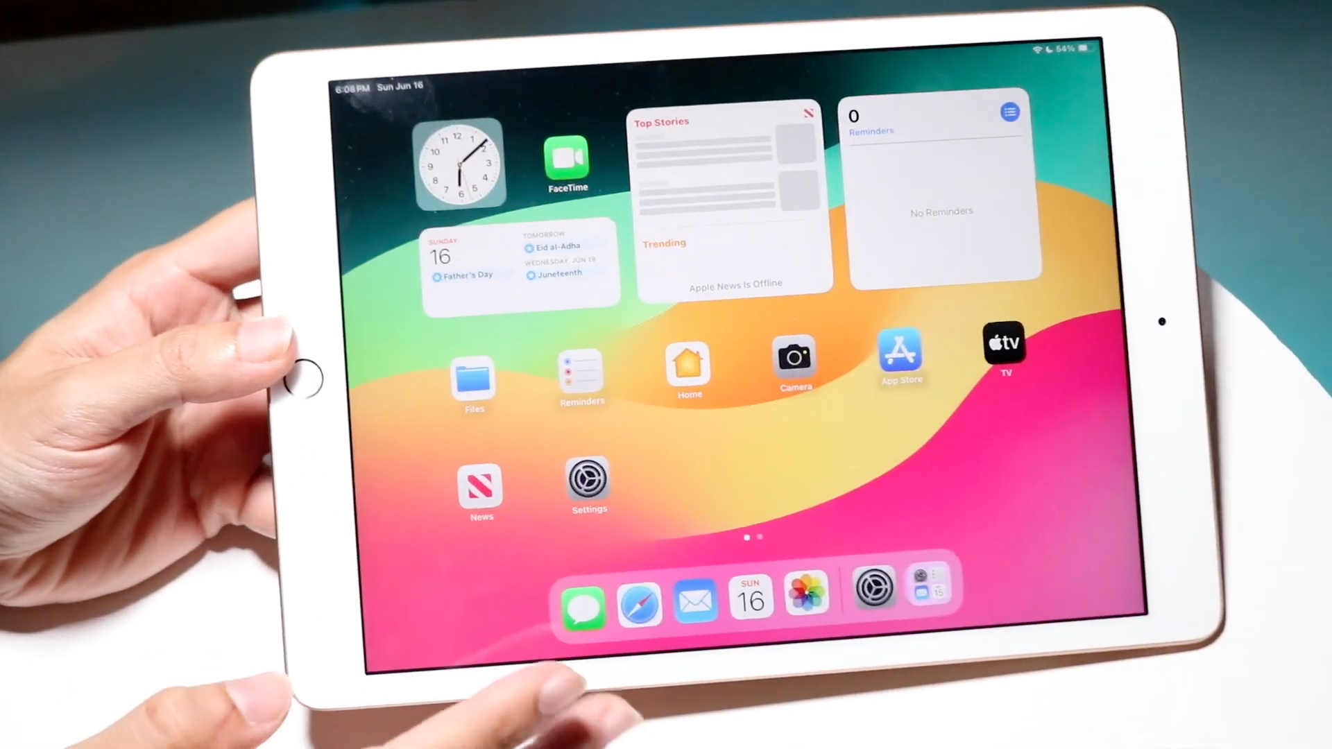 holding ipad home screen