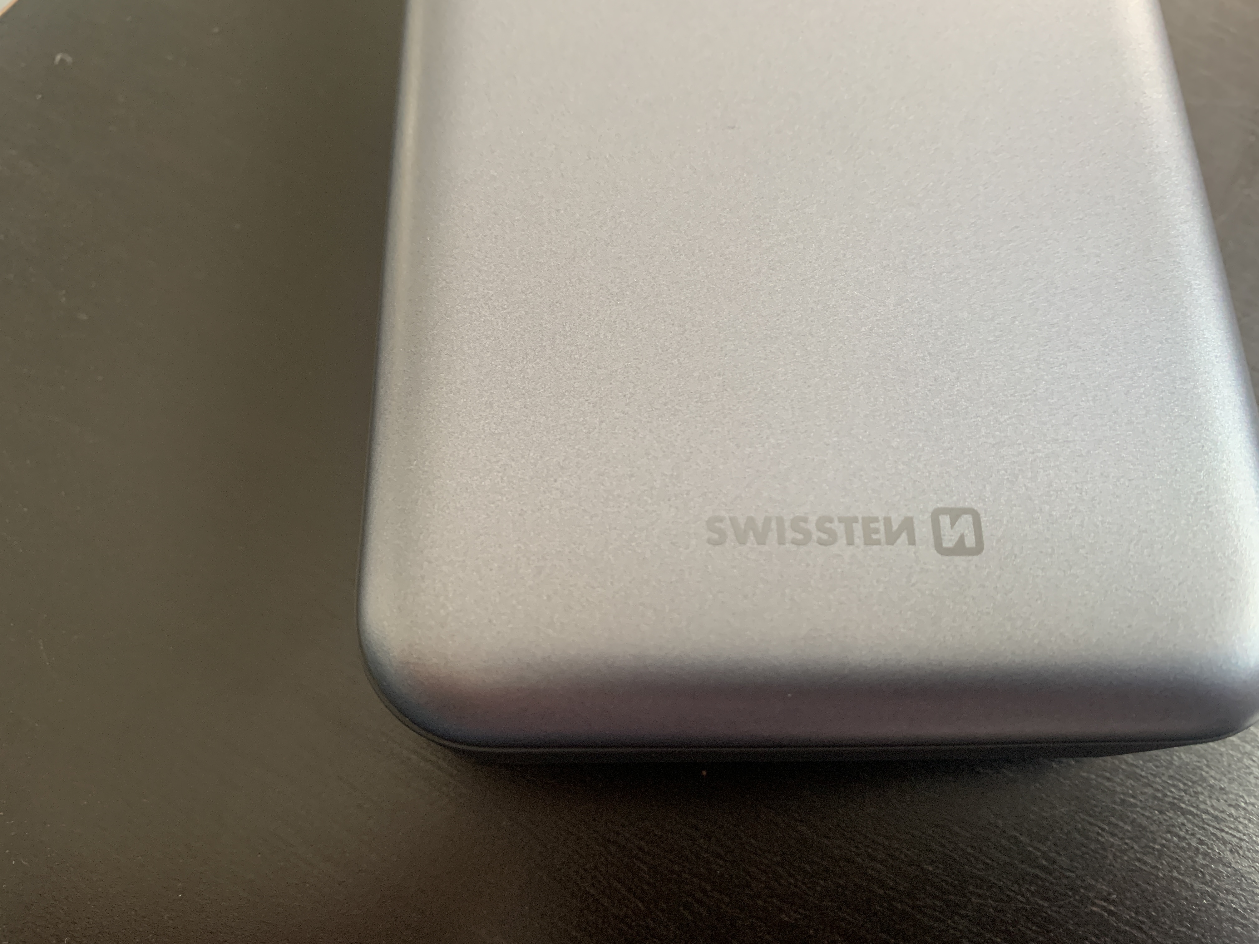 swissten power bank logo