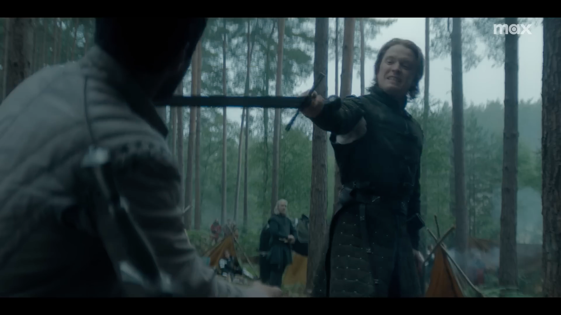 medieval sword fight in forest