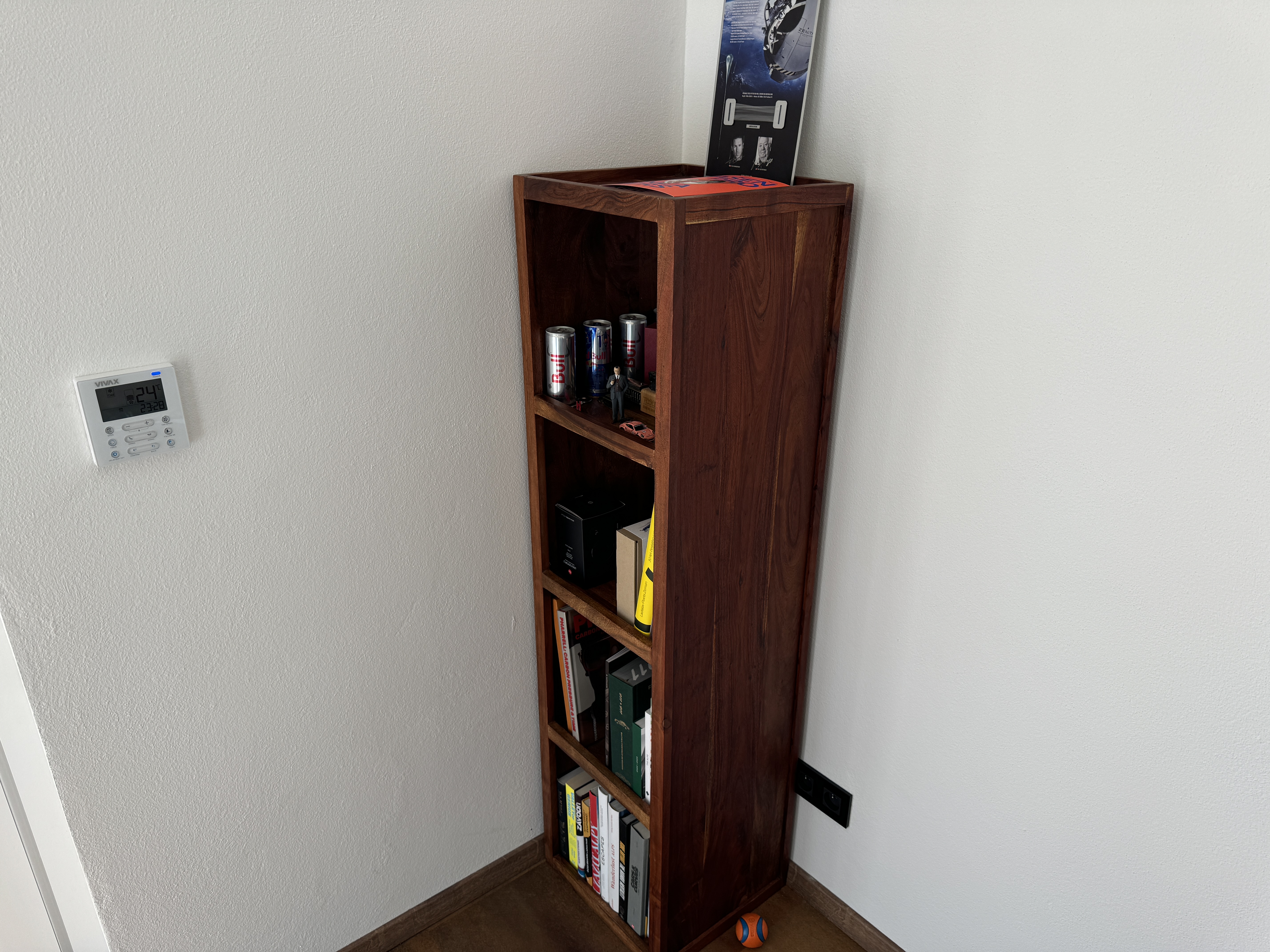 wooden bookshelf with items