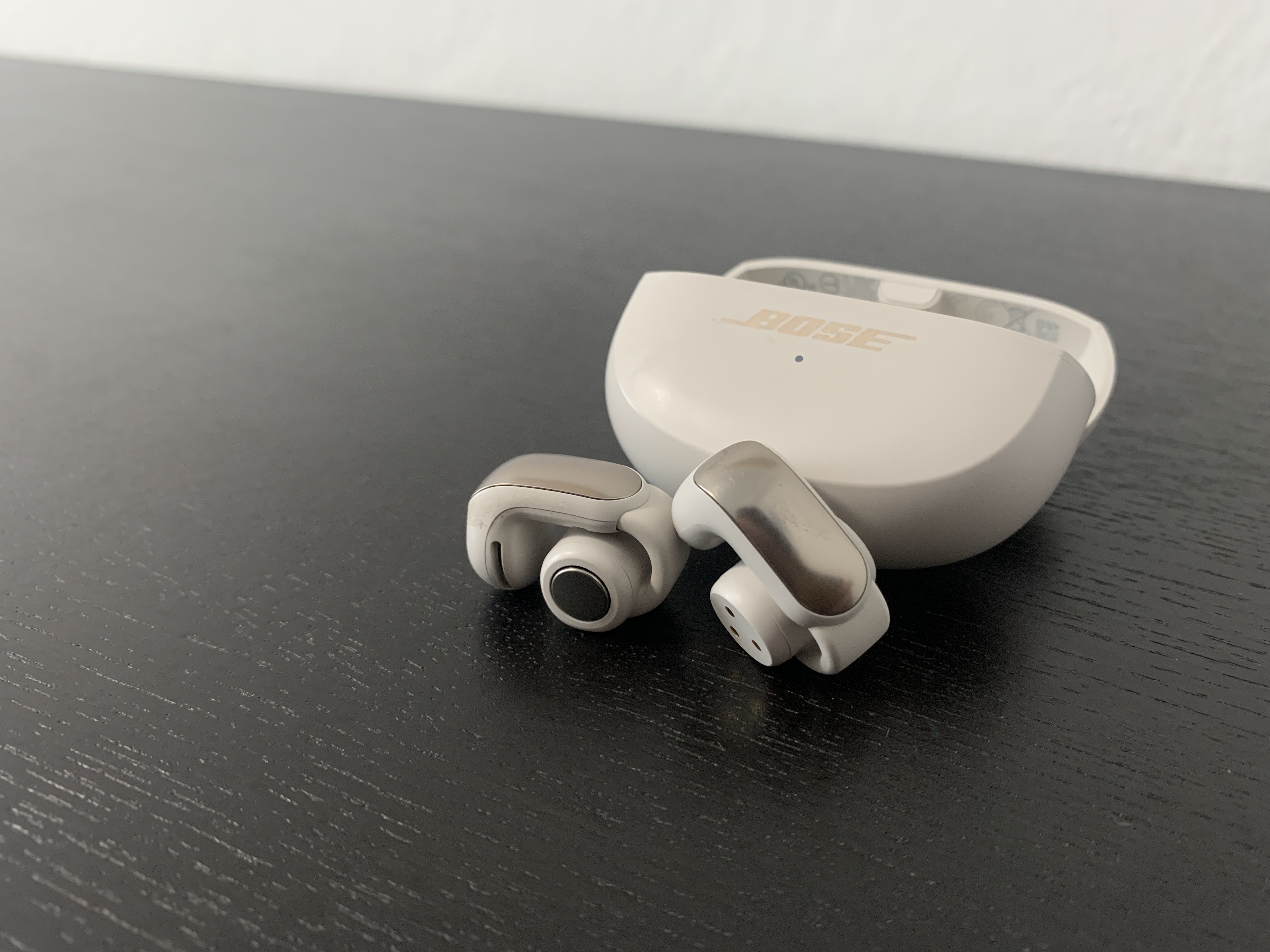 bose earbuds on table