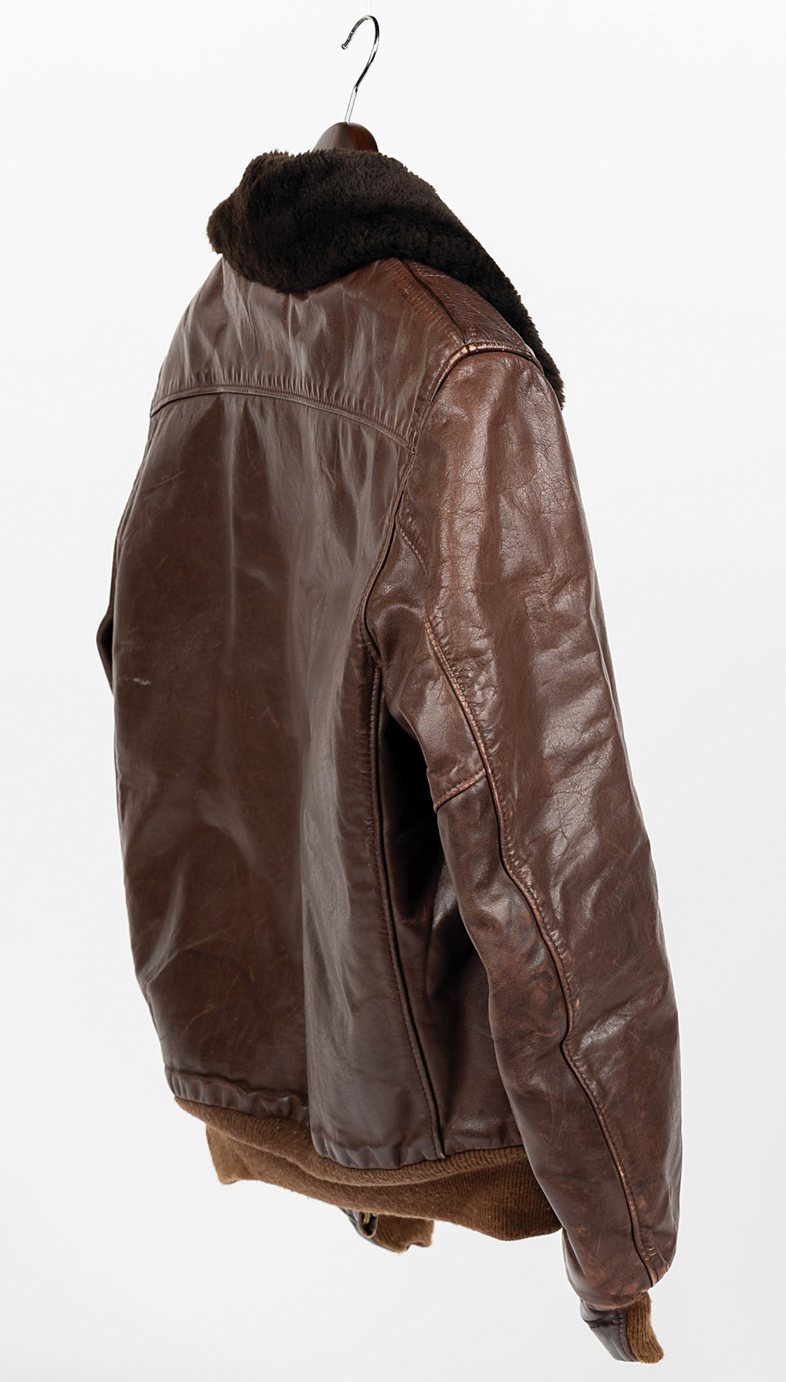 brown leather jacket hanging