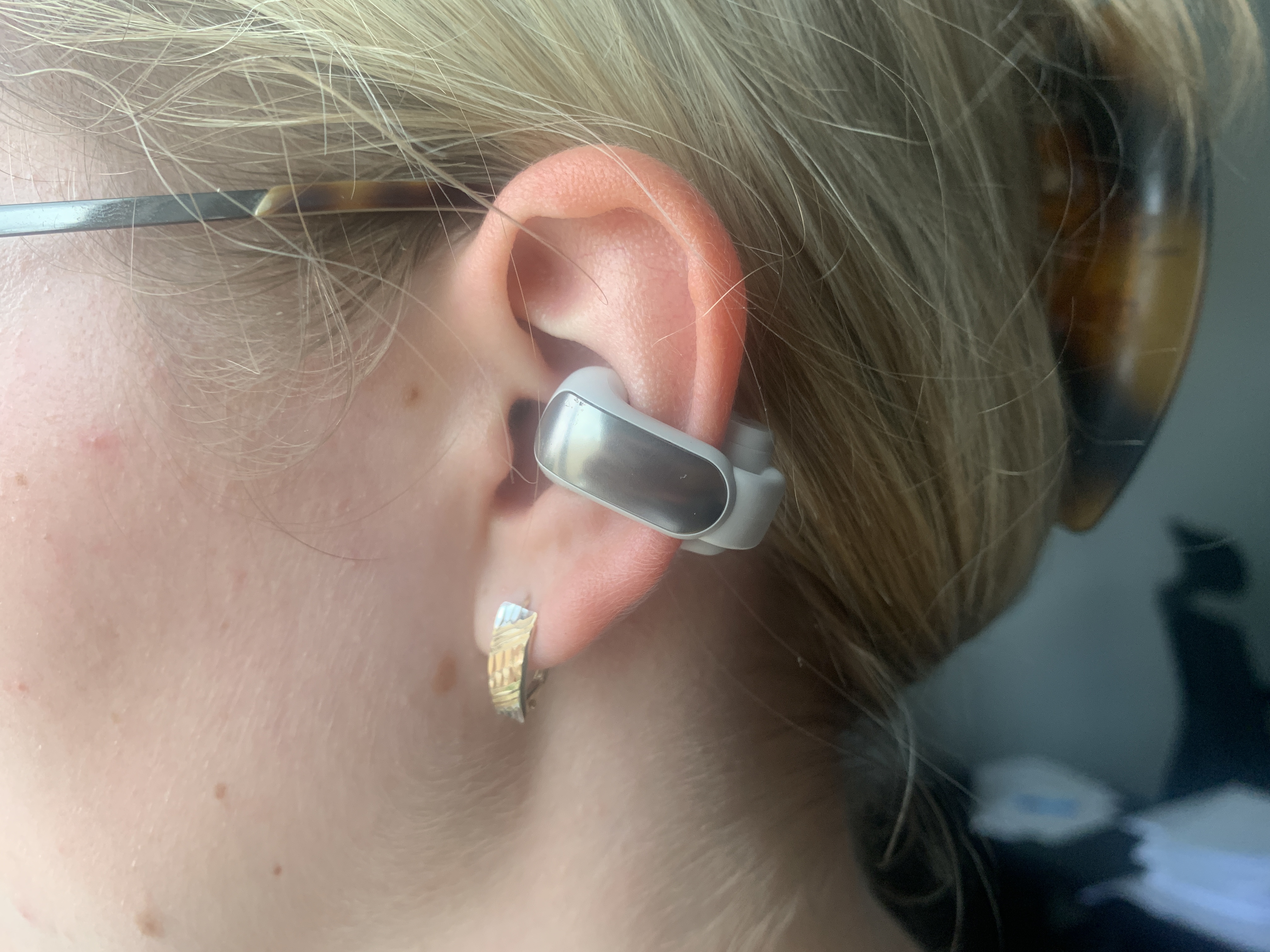 closeup ear with hearing device